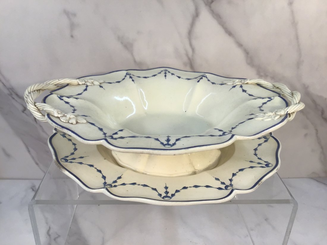 Neale & Co. Creamware Strap Handle Open Serving Bowl Platter C1780: Platter is 10" wide. Twisted Strap handles on bowl with overall blue swaged garland decoration. A rare and early example.
