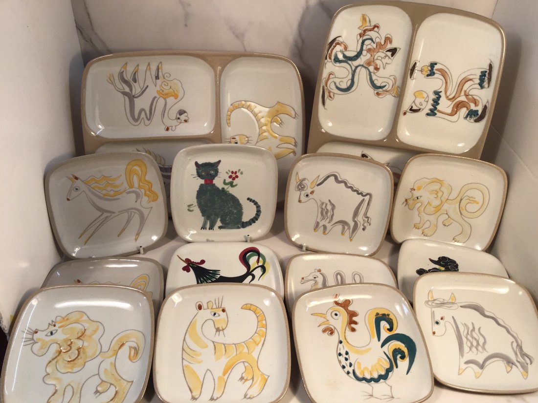 Lot of 14 Pieces Glidden Menagerie Circus and Poodle Plates: Largest platter is 12" wide and each of the smaller plates is 5.5" square.very good condition.