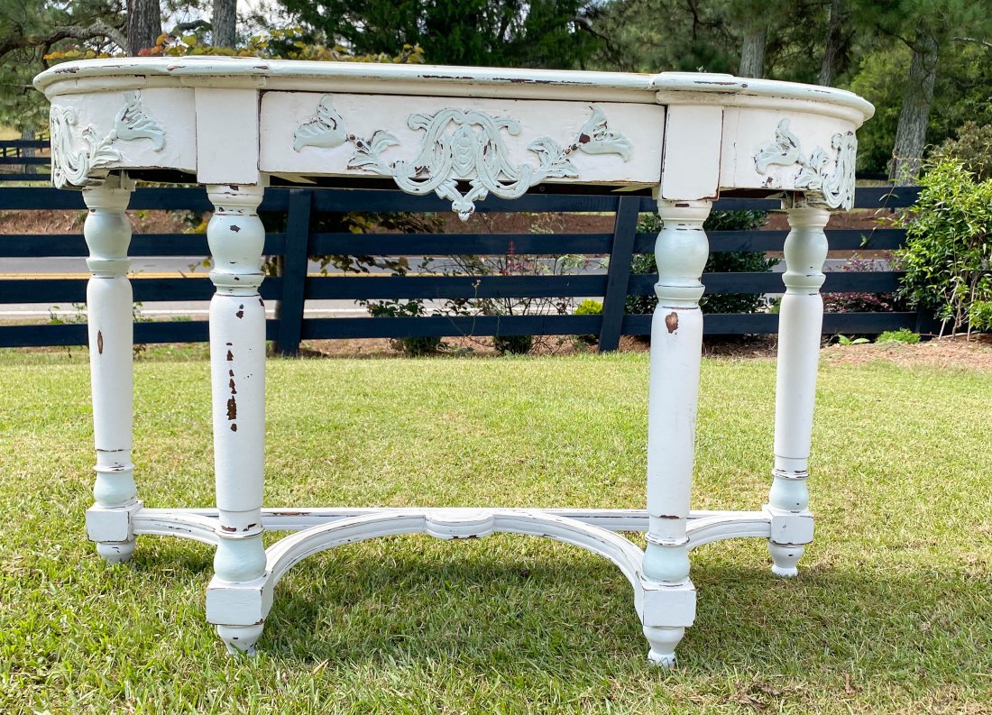 Distressed Side Table: Distressed Paint - Cream/White/OffWhite- with Light Blue Trim. measures approx 48L X 18W X30H"