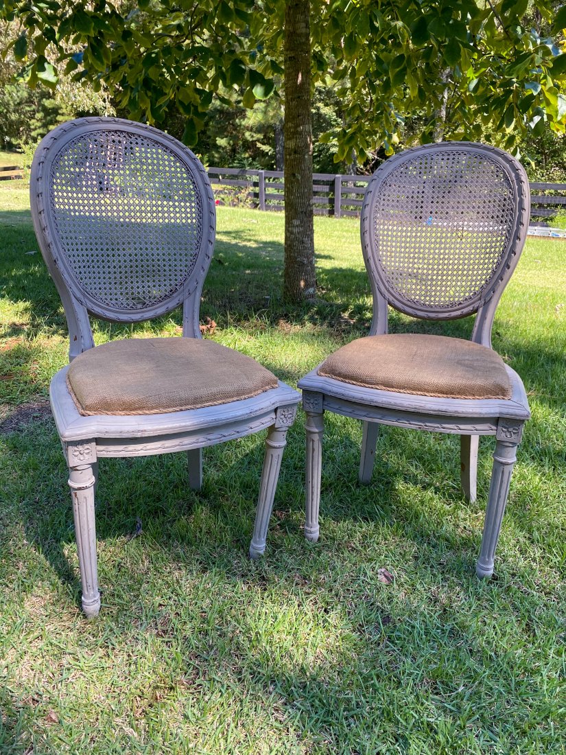 Pair of Cane Distressed Chairs w burlap seat.: Pair of Cane Distressed Chairs w burlap seat. Measures approx. 17x18.5x38"