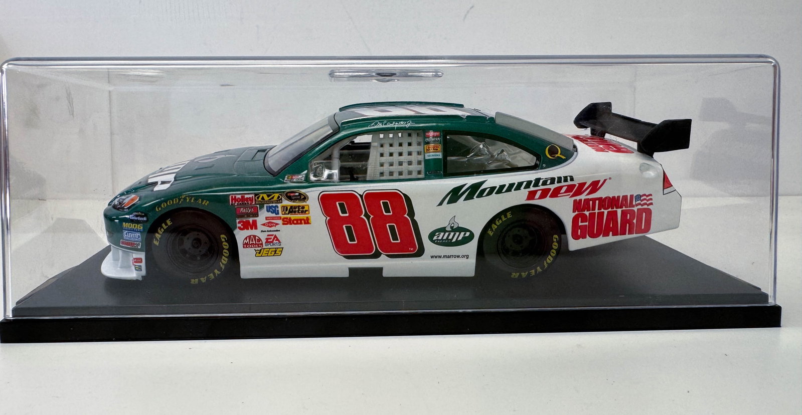 2008 DALE EARNHARDT JR MTN DEW 1:24 SCALE COLLECTIBLE RACE CAR: Up for bid is this highly collectible Dale Earnhardt Jr. Mountain Dew 2008 1:24 scale diecast car, meticulously crafted to replicate the iconic NASCAR vehicle. This model features the distinctive gree