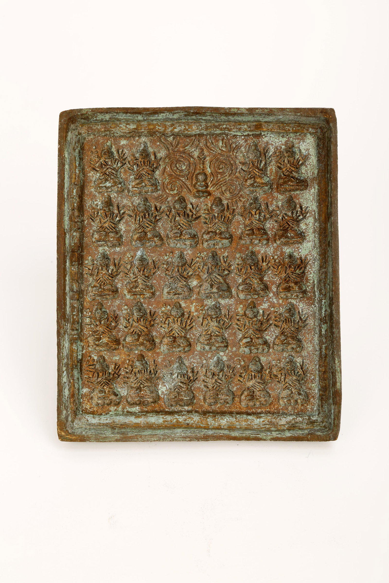 CHINESE BRONZE PRINTING PLATE CARVED WITH BUDDHA HEADS. (1 of 5)