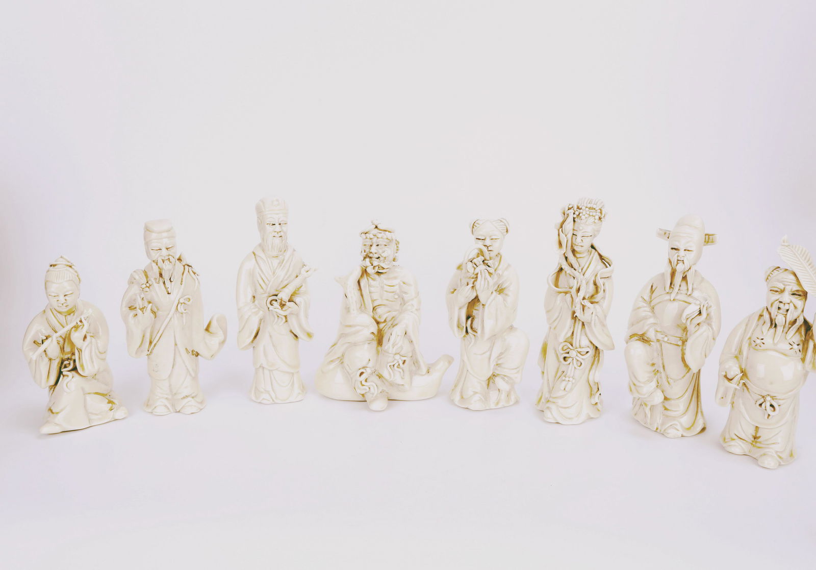 (8)   A SET OF EIGHT BLANC DE CHINE STANDING PORCELAIN (1 of 18)