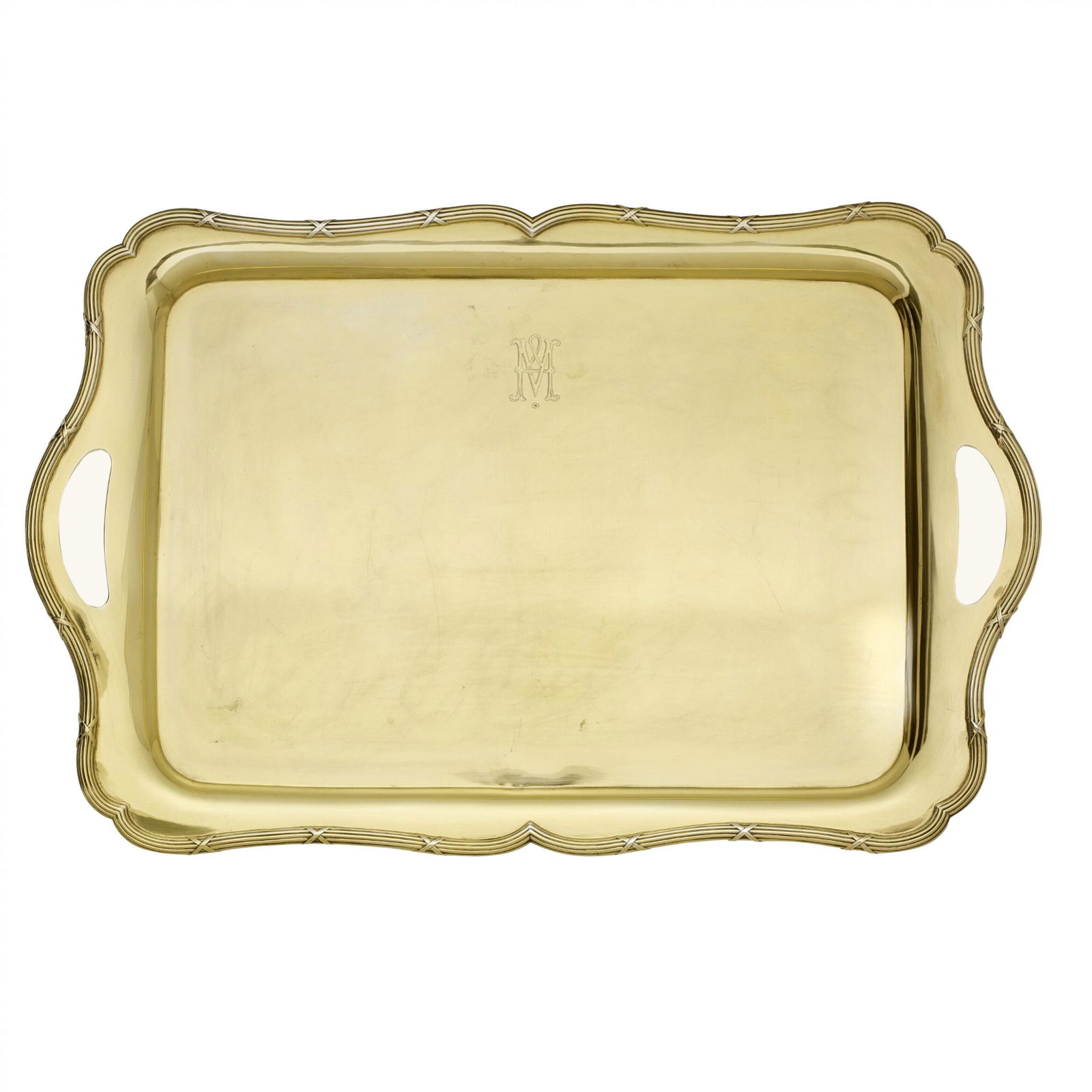 Silver gold plated tray. Grachev Brothers: Russian rectangular silver gilded serving tray , with two handles, decorated with profiled edging with crossed ribbons, the monogram letter "M" is engraved on the central upper part. Hallmarks: Mikhai