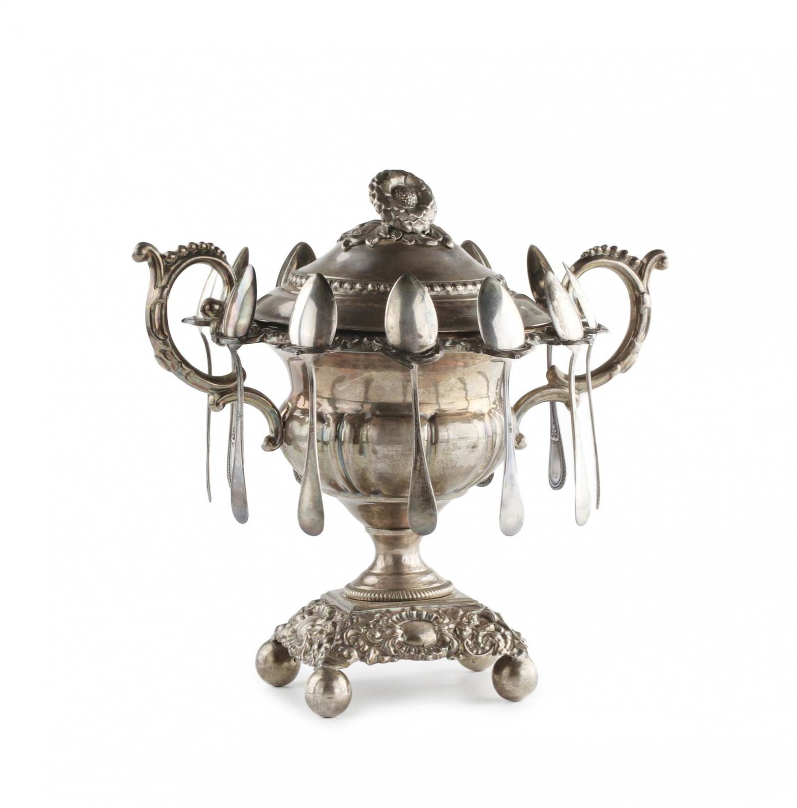 Silver jam vase: Silver jam vase in a form of a samovar with sockets for 12 spoons. It represented as samovar shape vase with large baroque handles and plant spoon handles. The handles on the lid are stylized as flowe