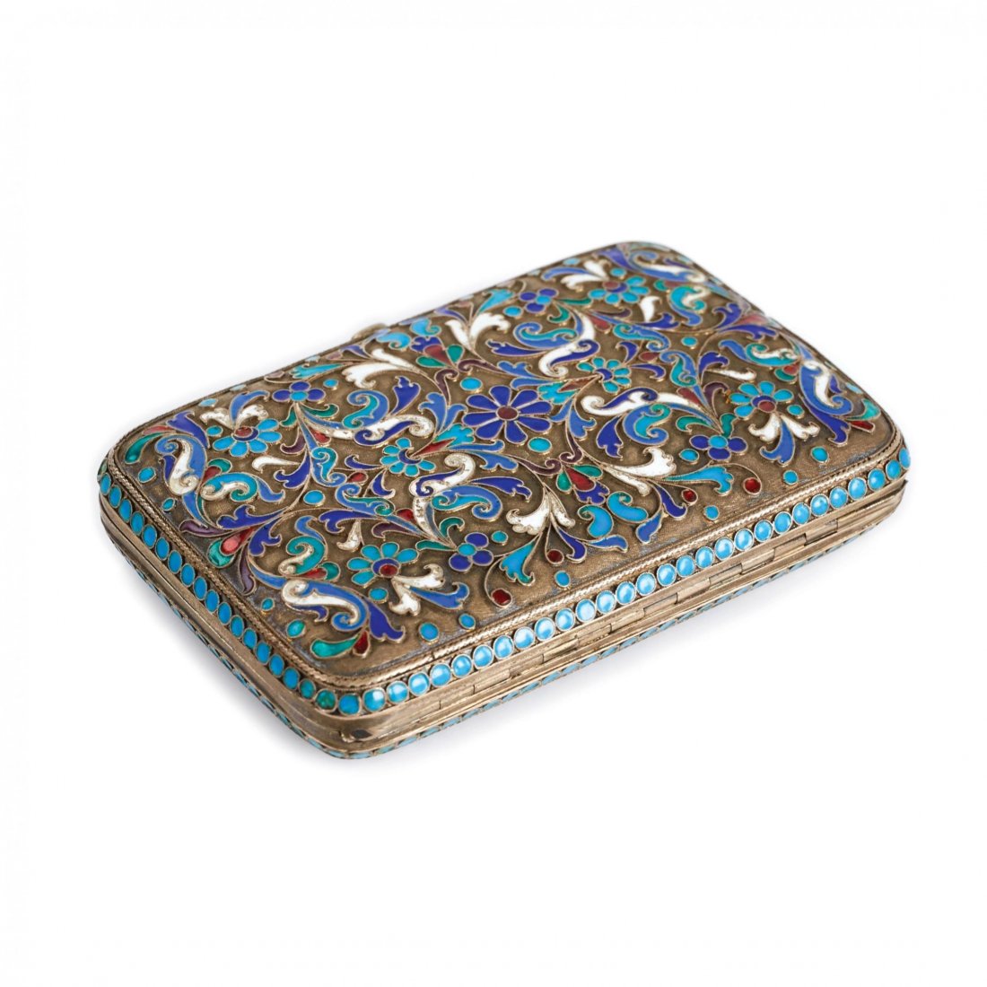 Silver cigarette case. Imperial Russia: A large silver cigarette case richly decorated with an art drawing in the Russian style, made using the cloisonne enamel technique. The inside of the cigarette case is gilded and has a calm inscriptio