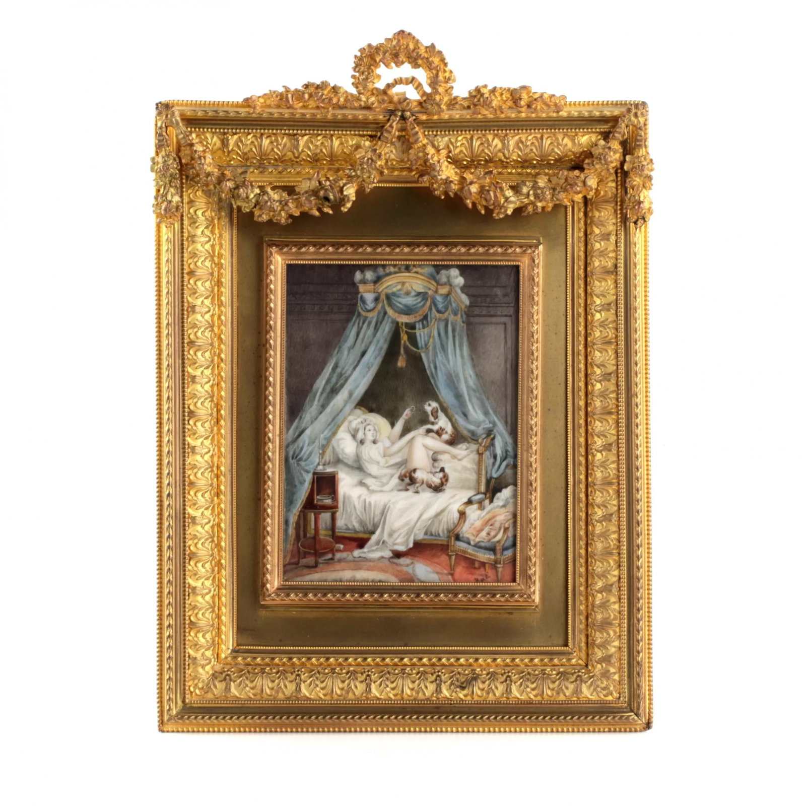 Playful miniature on bones in a gold frame.: Playful French miniature on bone in a gilded bronze and brass frame. Depicts the fun of a young lady with dogs, on a bed under a canopy. A minute of carefree bliss in anticipation of love is presented
