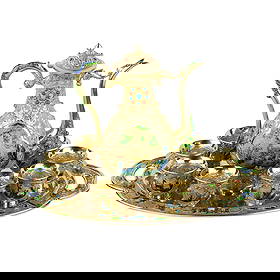 Chinese antique gilt silver enamel tea set. 20th century: Chinese gilt silver tea set with rich chased and embossed ornament in the form of a plant pattern, decorated with enamel drawings depicting natural scenes with deer and cranes, made in the Chinese nat