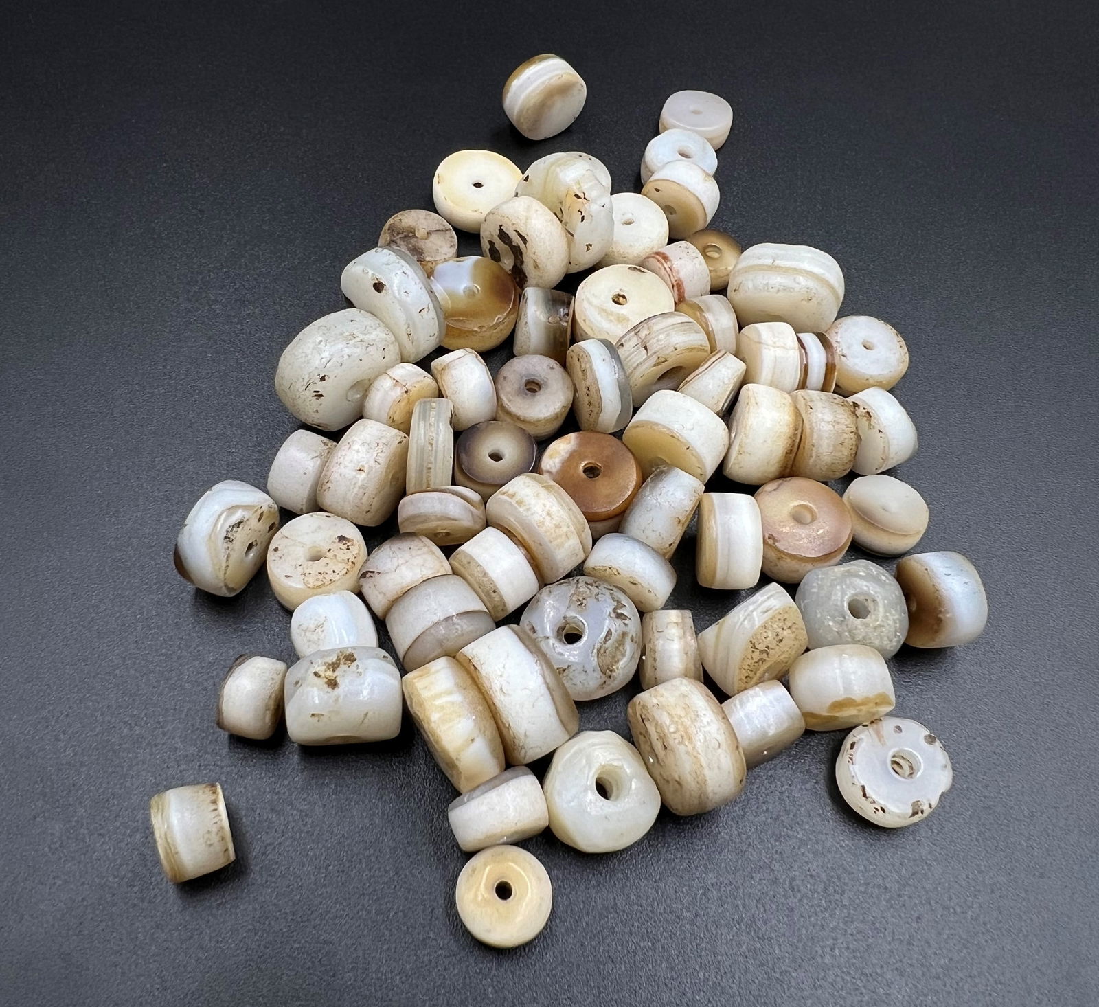 Antique White Agate Stone 1000 Years Old Beads: Beautiful Nice Collection Of Ancient White Banded Agate Stone Beads. Age Of These Beads 1000 Plus. Size Details Pictures Are Listed. Condition Of Beads As Shown In The Pictures.