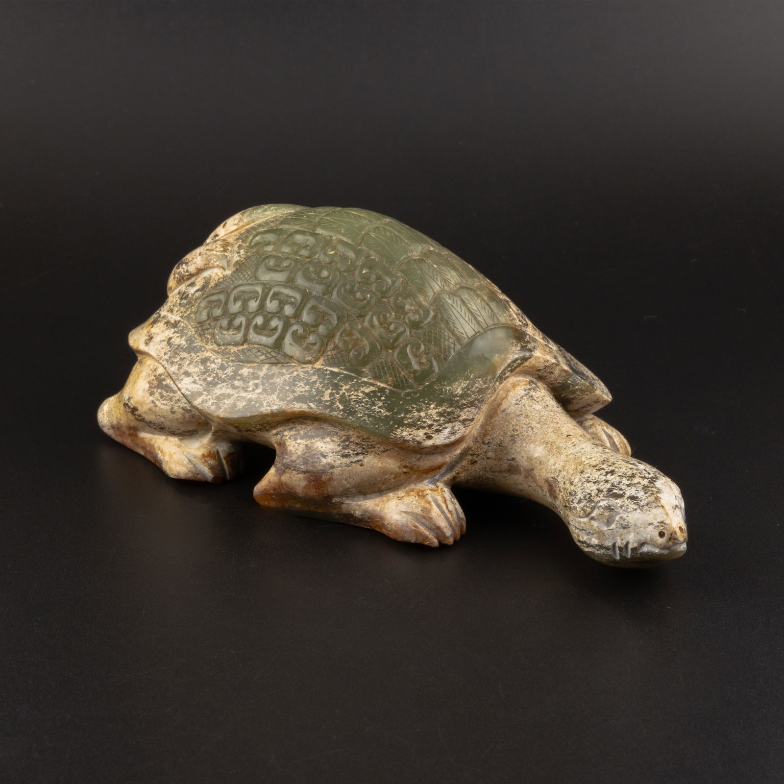 Jade Turtle, Western Zhou Dynasty (c. 1050_771 BCE)[15.1 x 5.7cm, 609gram]: Dimensions: 15.1 x 5.7 cm | Weight: 609 g This finely carved jade turtle exemplifies the craftsmanship and symbolic artistry of the Western Zhou period. With its compact form and substantial weight, t