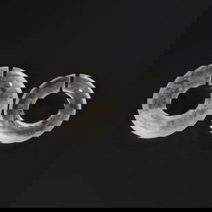 Warring States Chinese Crystal Quartz Earrings (Pair): A rare pair of crystal quartz earrings from China’s Warring States period. Measuring approximately 2 x Ø4–4.5 cm and weighing 36 grams in total.