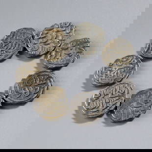Lot of 7 Medieval Era Indian Silver Coins – Multi Dynasty: Collection of 7 silver coins from India’s medieval era, representing multiple dynasties. Sizes range approx. 1.3–1.5 cm diameter, total weight 25 grams.