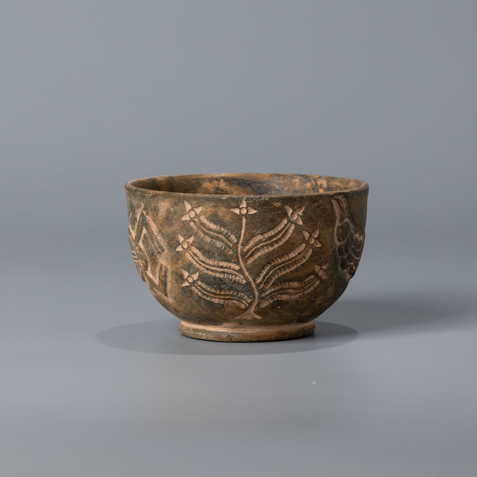 Ancient Western Asiatic Chlorite Pot with Carved Motifs & Inscription: A finely carved Western Asiatic chlorite pot featuring figural and floral motifs along with an ancient inscription.