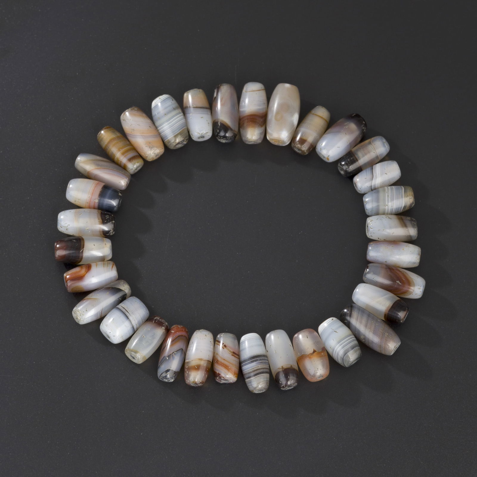 Lot of Ancient Himalayan Agate Beads — Silk Road Region (Tibet, Nepal, India): A lot of ancient Himalayan agate beads originating from the Silk Road region, including Tibet, Nepal, and India. Total Weight: 90gram