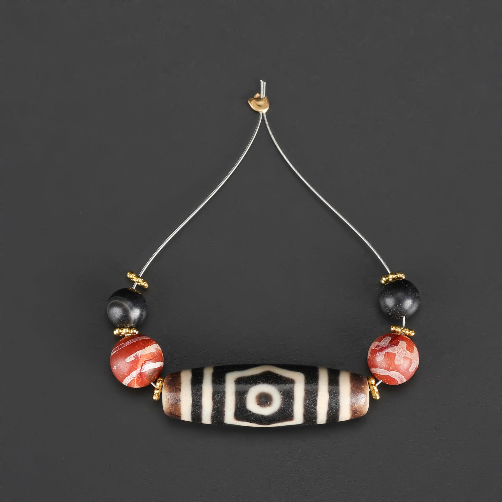 Tibetan 3-Eyed Dzi Agate Bead (1 of 4)