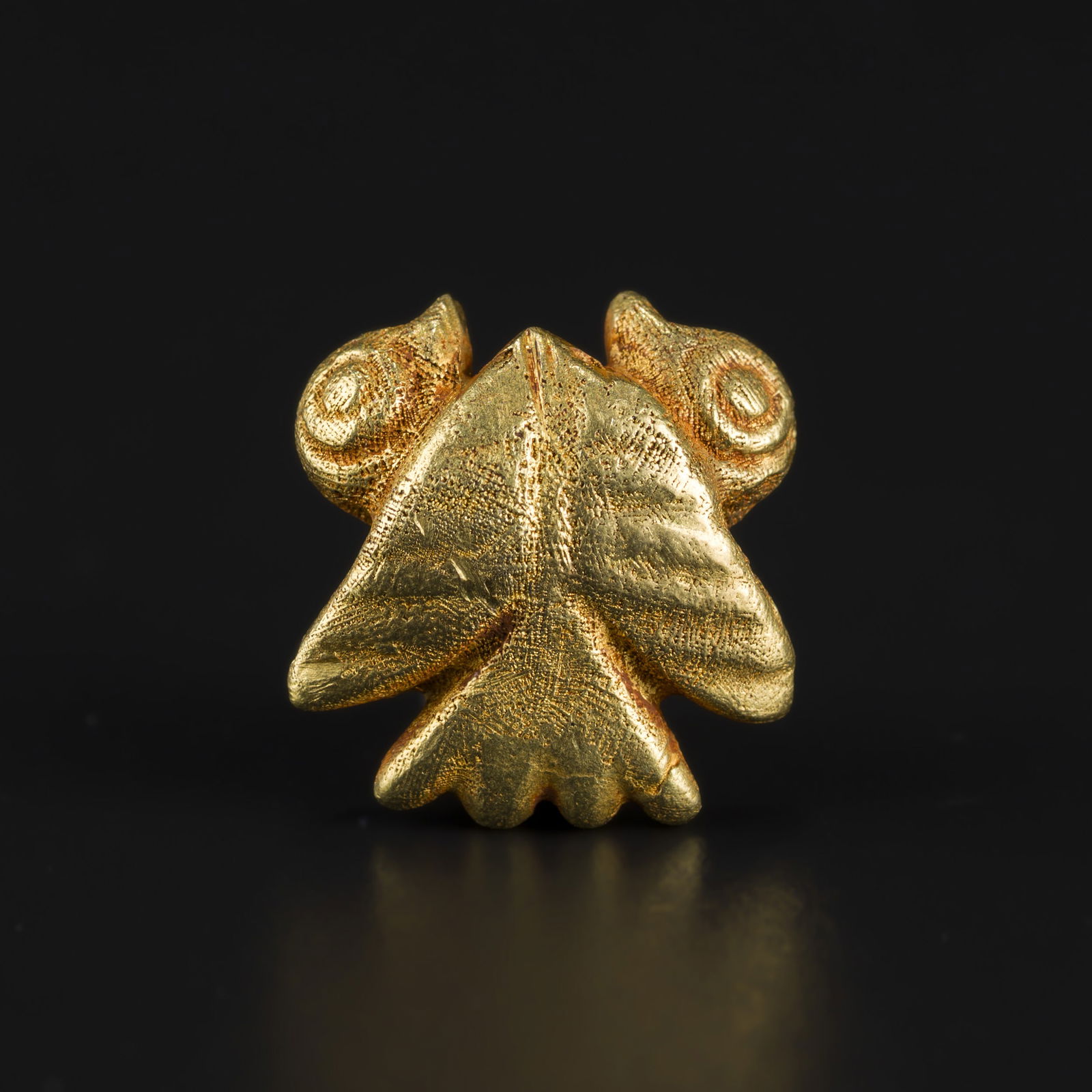 Ancient Roman Gold Double Bird Motif Amulet Pendant: An Ancient Roman gold amulet pendant featuring a double bird motif, finely worked with balanced symmetry and symbolic ornamentation. Size Detail: 1.3 x 1.4cm Weight: 6gram