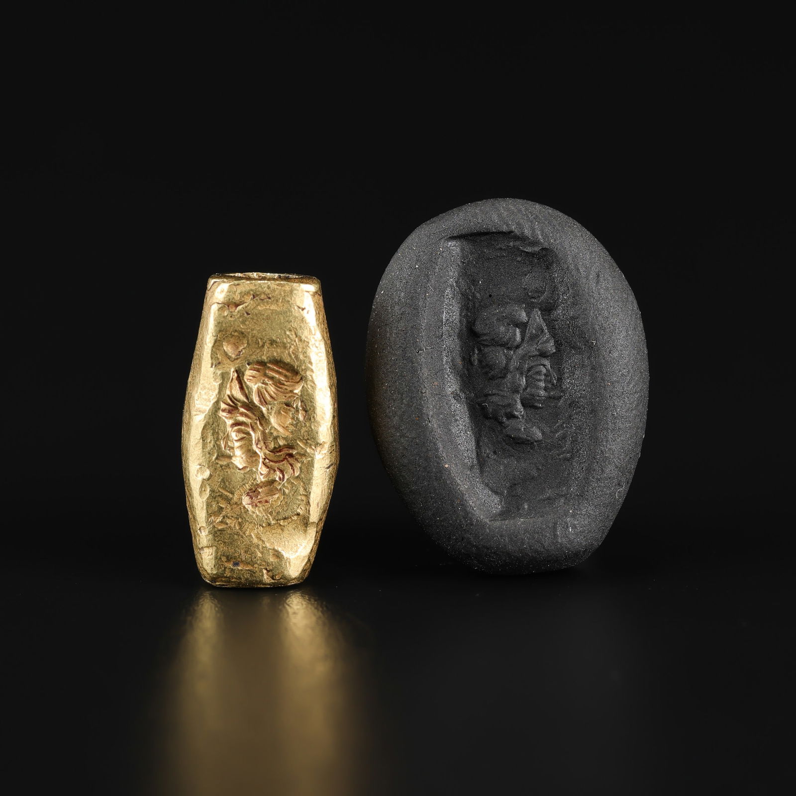 Bactrian Greek 19K Gold Bead Pendant with Human Profile Stamp: An Ancient Bactrian Greek gold bead pendant crafted in 19K gold, featuring a stamped human profile rendered in relief. Size Detail: 0.8 x 1.6cm Weight: 6gram