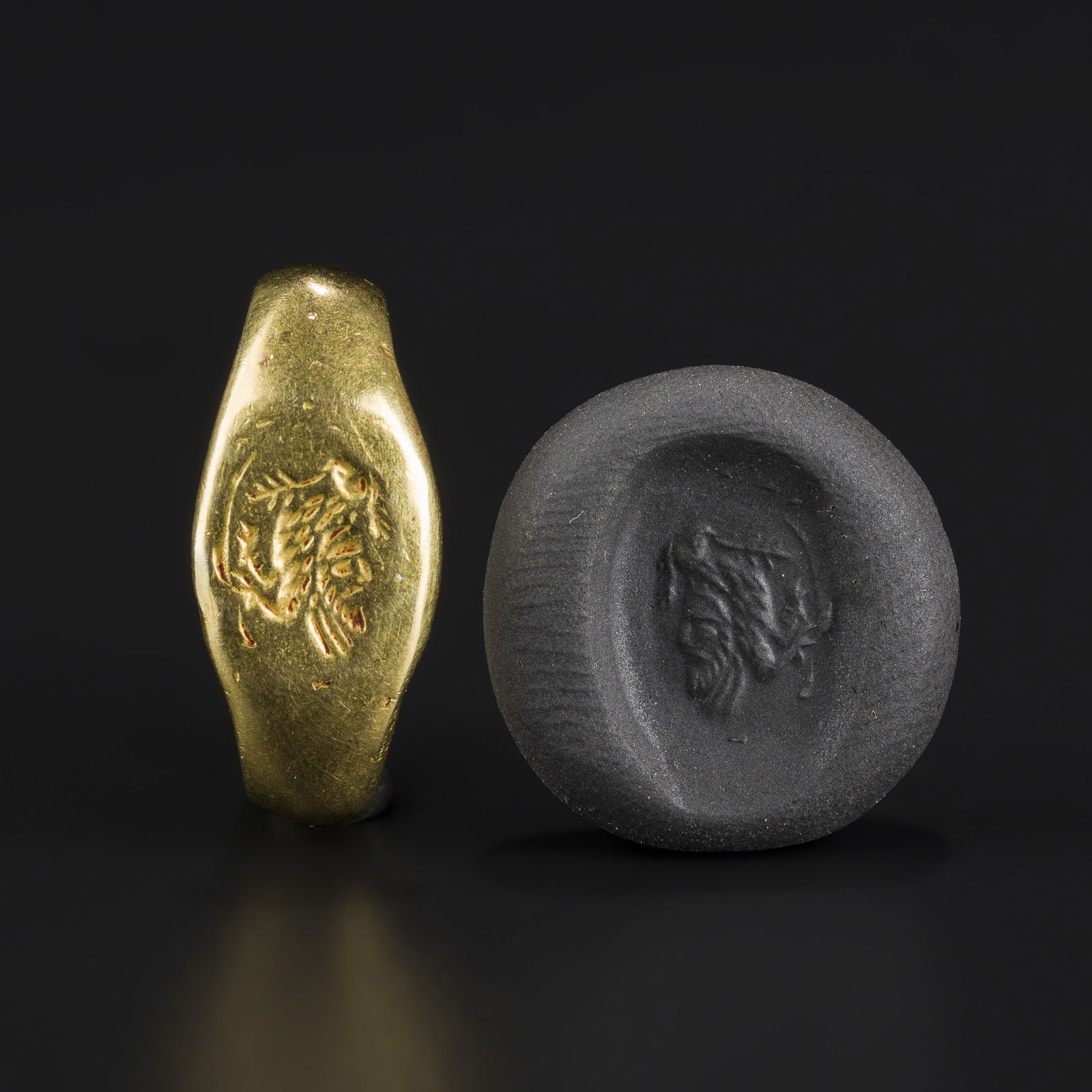 Ancient Hellenistic Greek Solid Gold Ring with Bearded Human Profile Intaglio: An Ancient Hellenistic Greek solid gold ring (size 7.5, weight 7 g) featuring a finely engraved bearded human profile in intaglio directly on the bezel. Weight: 7gram