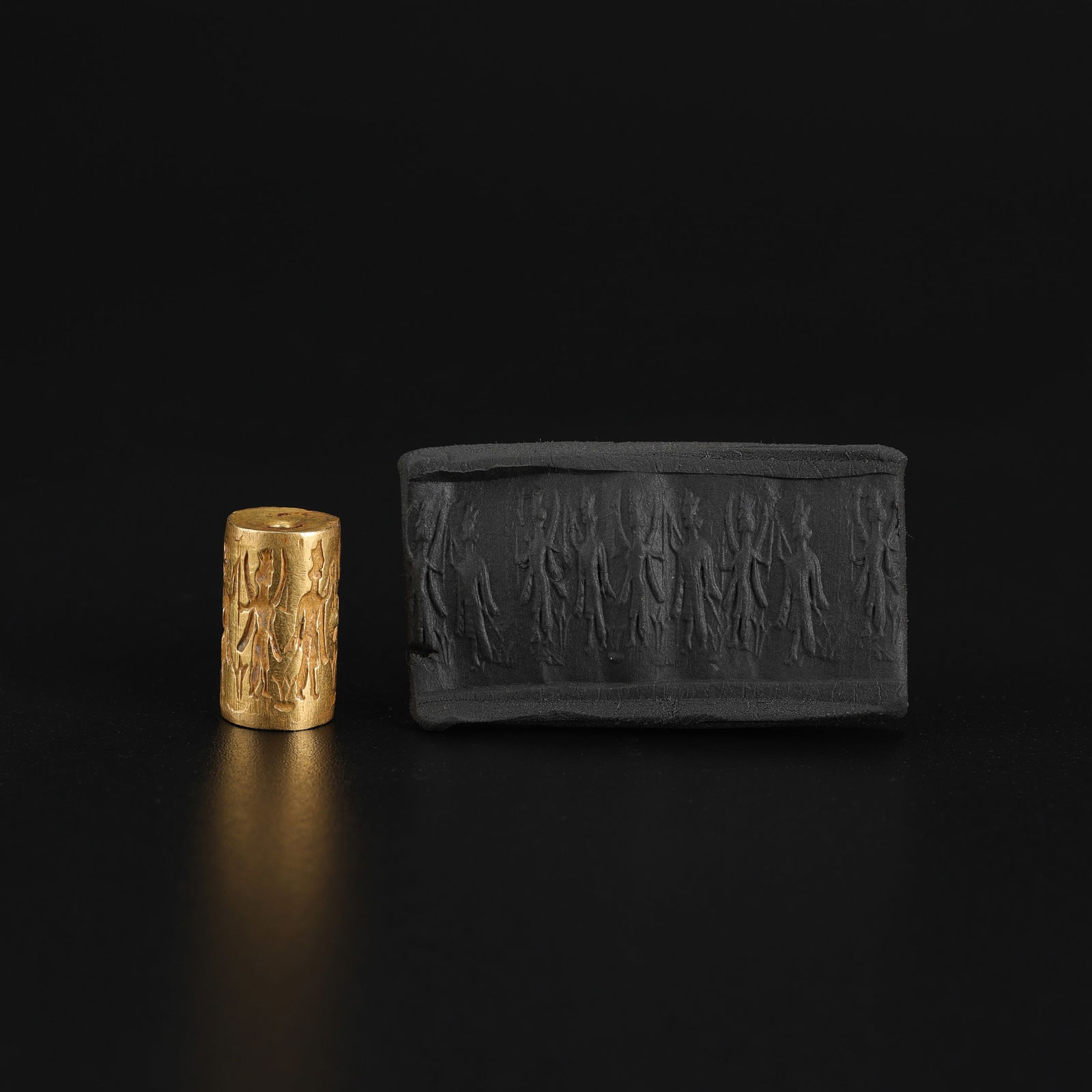 Sasanian Cylinder-Shaped Seal Gold Pendant: An Ancient Sasanian cylinder-shaped seal pendant crafted in gold, featuring finely engraved intaglio designs. Size Detail: 0.9 x 1.6cm Weight: 3gram