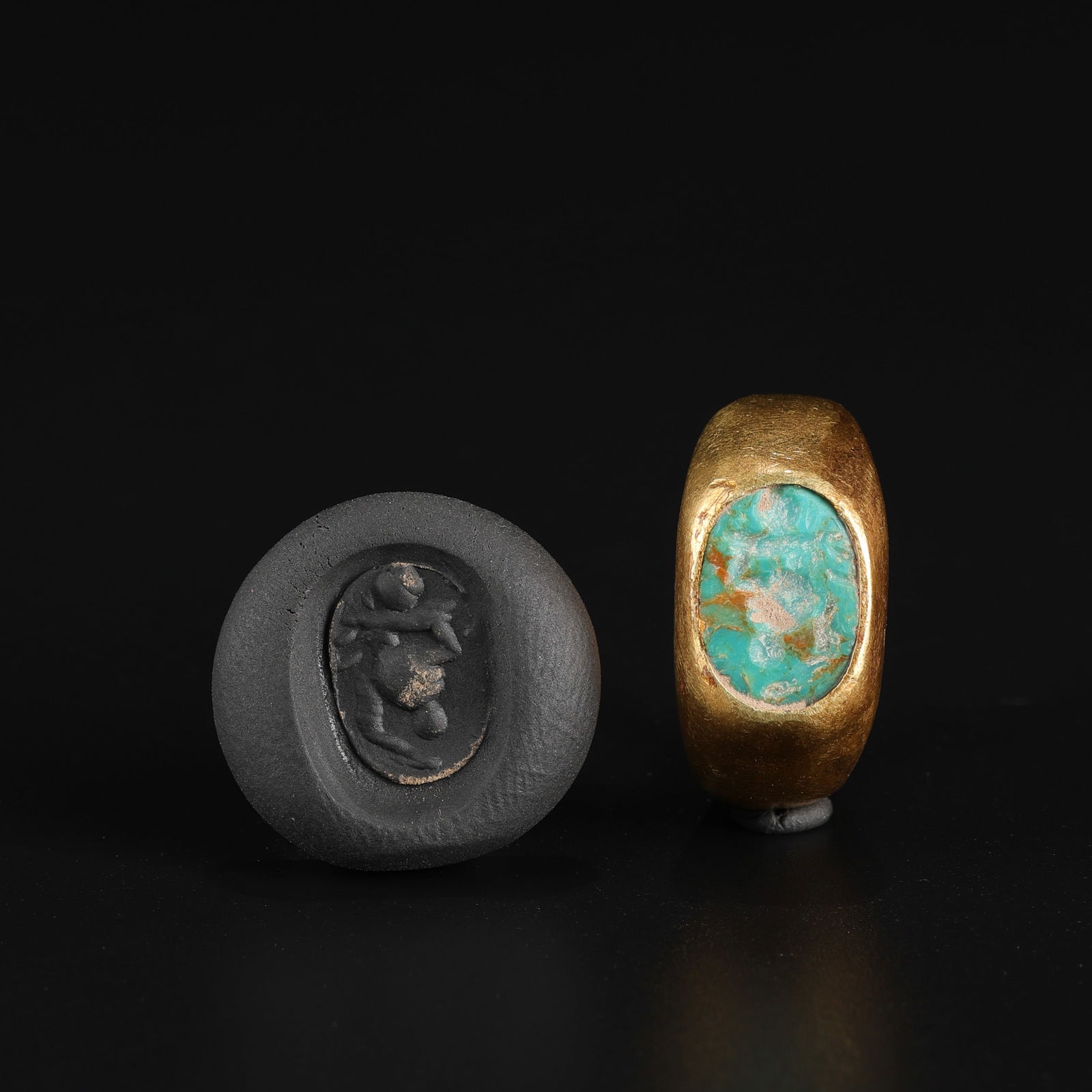 Ancient Bactrian-Greek Gold Ring with Turquoise Bezel Intaglio Bust: An Ancient Bactrian-Greek ring crafted in gold, featuring a turquoise bezel engraved with an intaglio bust. Total Weight: 11gram