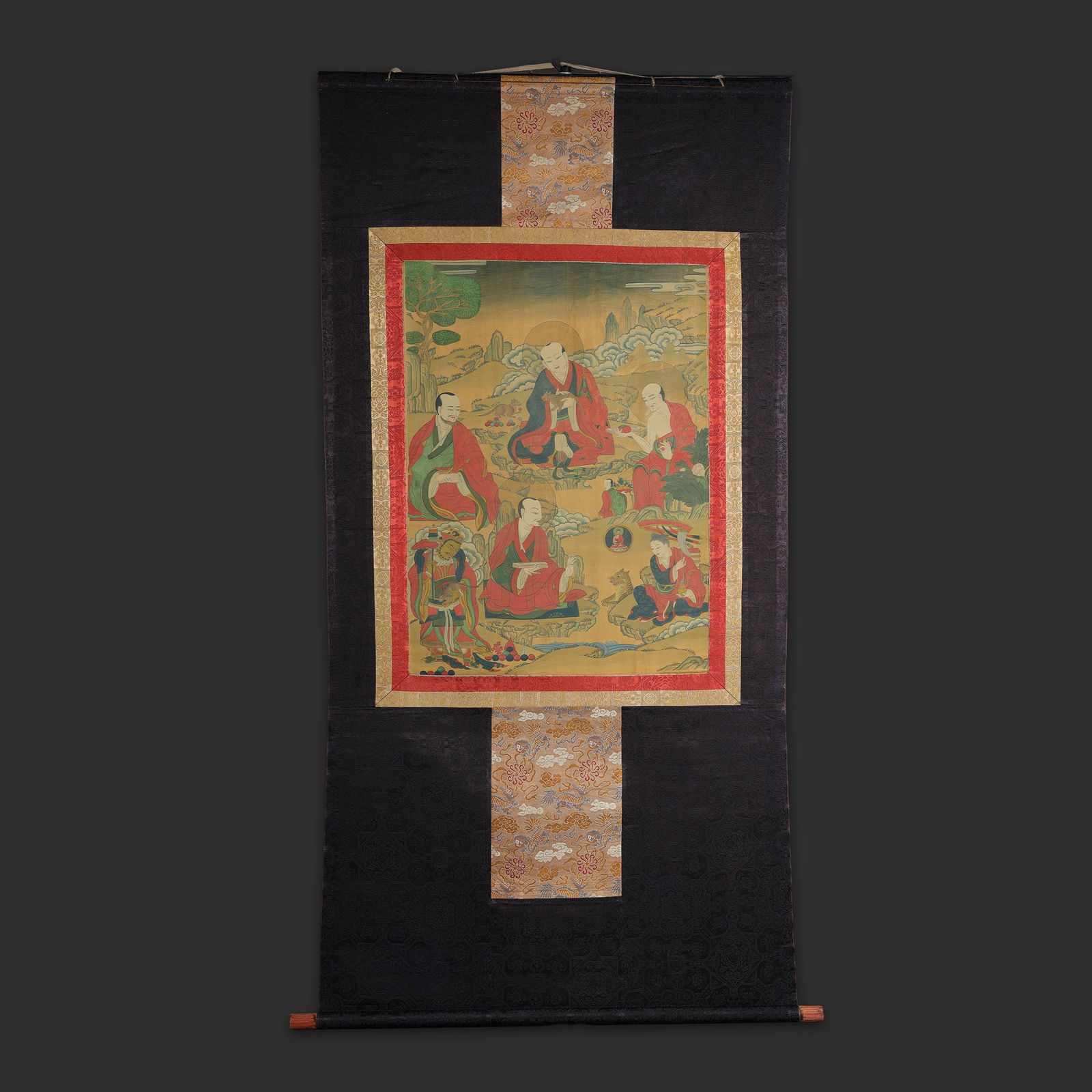 Antique Tibetan Thangka Painting of Depicting several Arhats Figures with Silk Border: Antique Tibetan Thangka Painting of Depicting several Arhats Figures with Silk Border Size Detail: 32 x 141cm Total Weight: 800gram