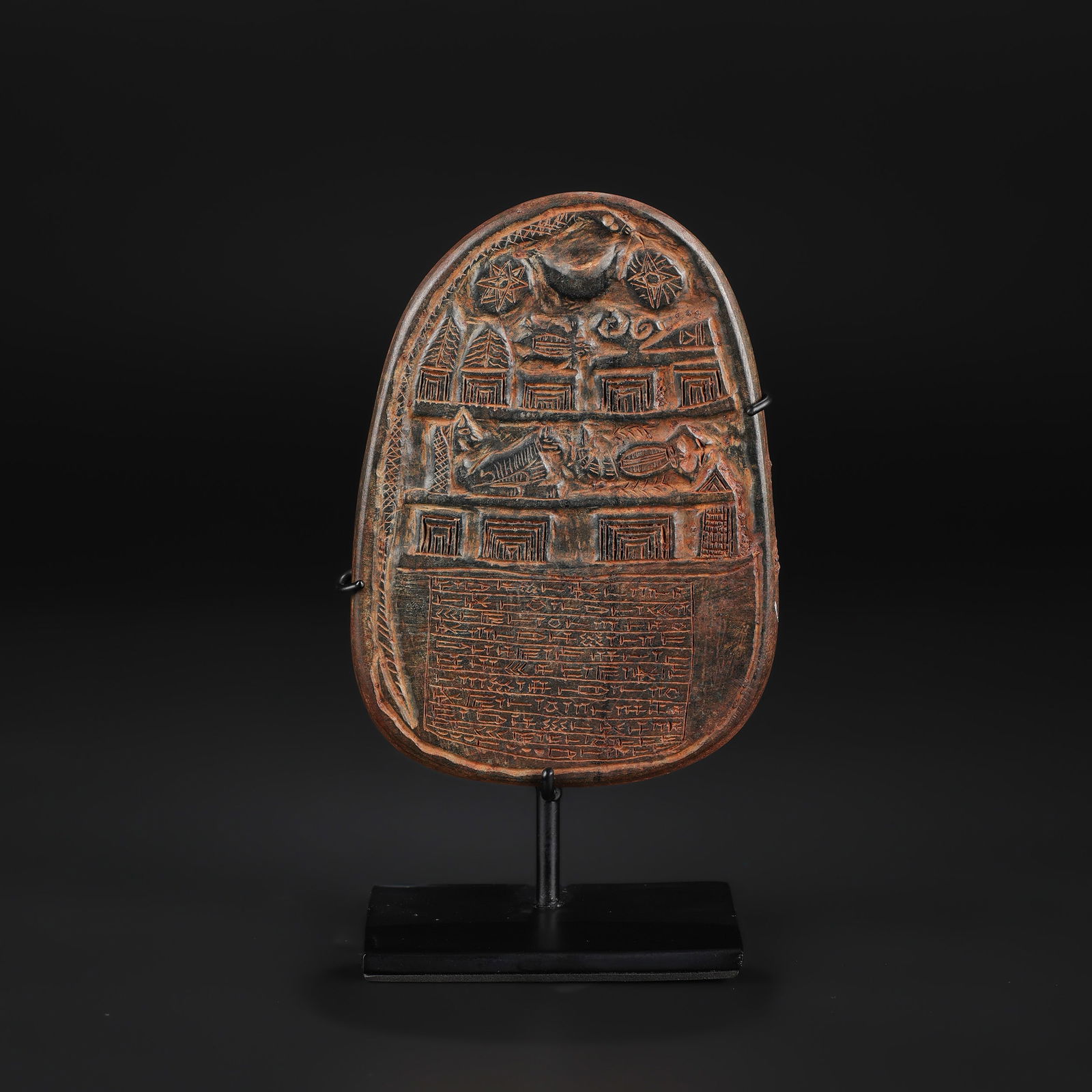 Near Eastern Carved Black Stone Tablet with Cuneiform Script: Ancient Near Eastern black stone tablet featuring carved cuneiform script and symbolic motifs. Size Detail: 8.5 x 13cm Weight: 183gram