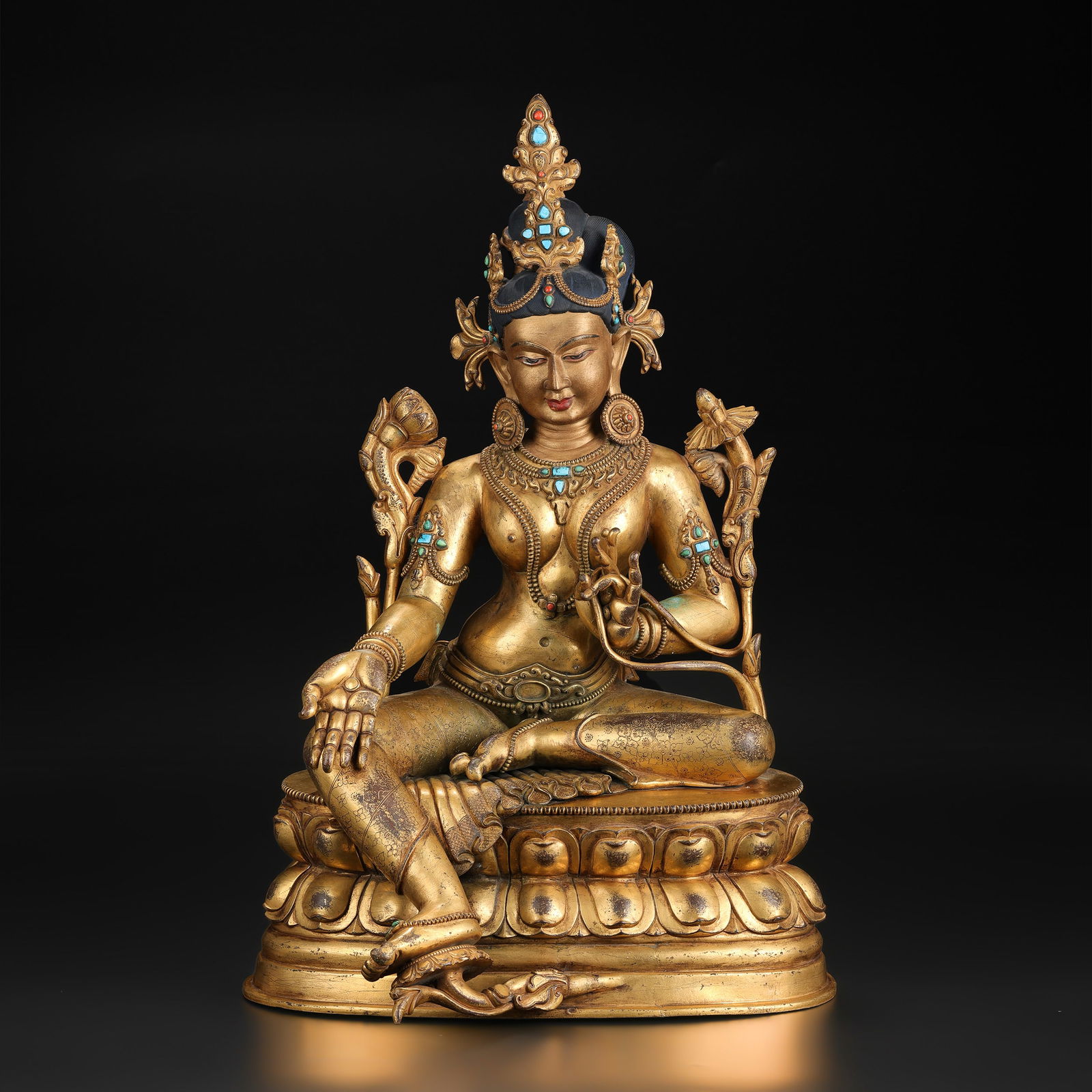 Qing Dynasty Tibetan Gilt Bronze Seated Green Tara, Turquoise & Coral Inlay, Double Lotus Base: Qing Dynasty Tibetan gilt bronze figure of Green Tara, seated on a double lotus base and intricately inlaid with turquoise and coral. Size Detail: 34.5 x 52cm Weight: 15.6kg