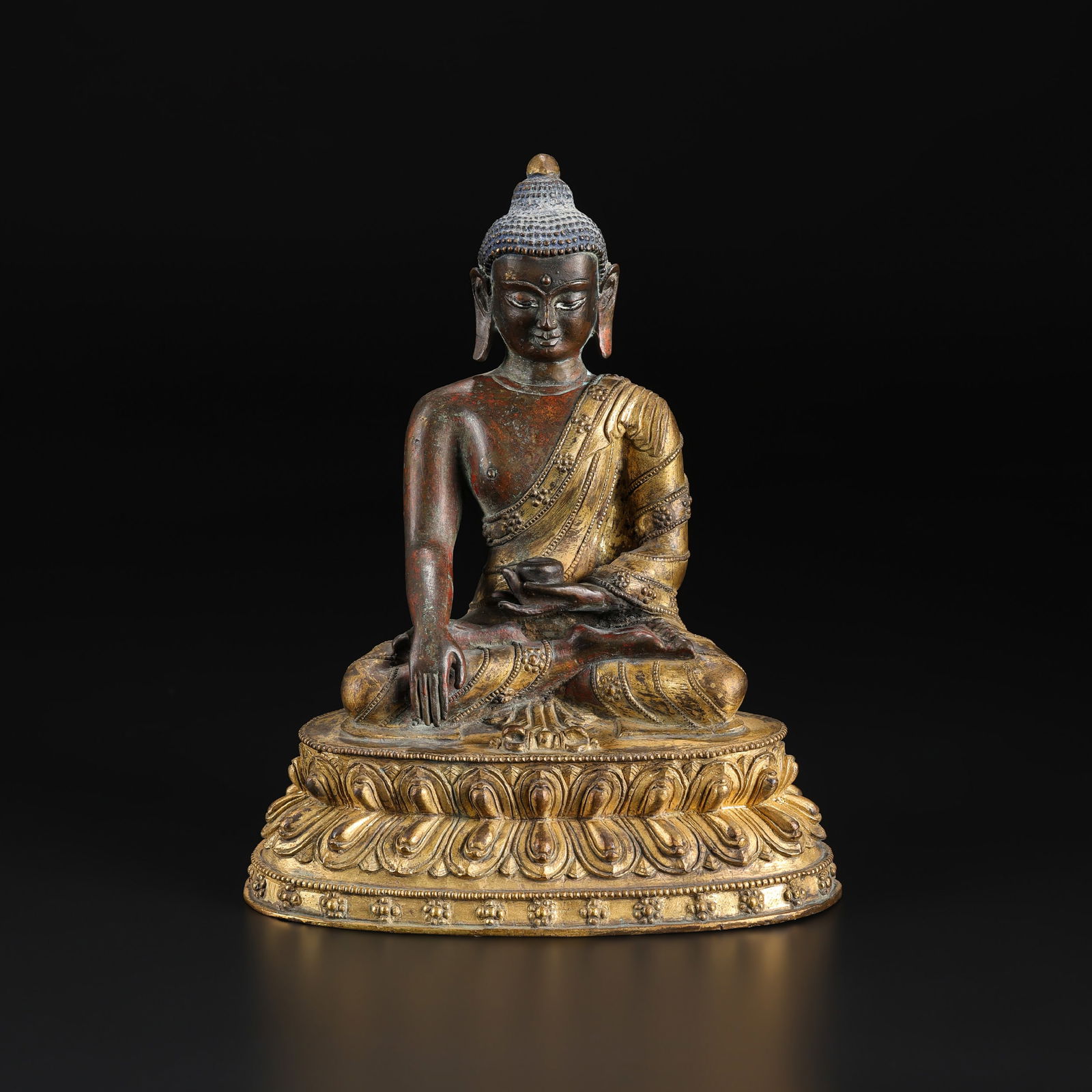 Qing Dynasty Tibetan Gilded Bronze Figure of Buddha: Qing Dynasty Tibetan bronze figure of Buddha, gilded and finely cast with intricate detailing. Size Detail: 16 x 19.5cm Weight: 2.7kg