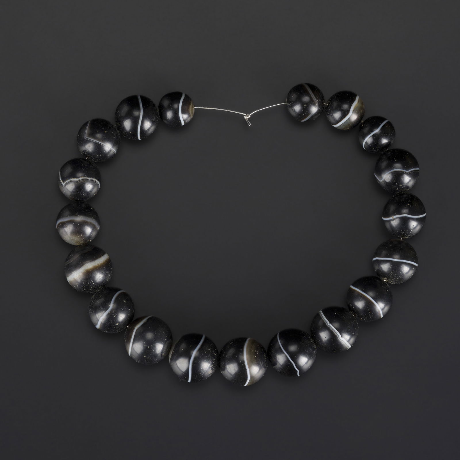 Antique Indo-Tibetan Babagoria Banded Agate Rami Beads – 19 Beads: Antique Indo-Tibetan Babagoria Banded Agate Rami Beads – 19 Beads Length: 12.5in Total Weight: 140gram