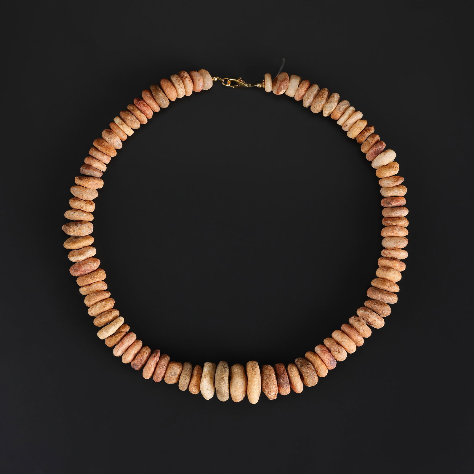 A Neolithic Quartz Bead Necklace: A Neolithic Quartz Bead Necklace Length: 23in Total Weight: 276gram