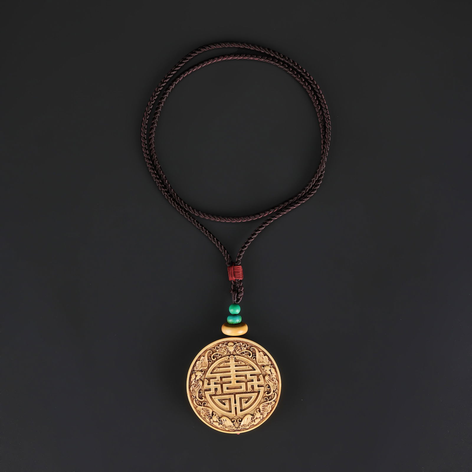 Carved Bone Pendant with Chinese Double Happiness Symbol: A carved bone pendant featuring the Chinese “Double Happiness” character, showcasing detailed craftsmanship and traditional symbolism. Total Weight: 48gram