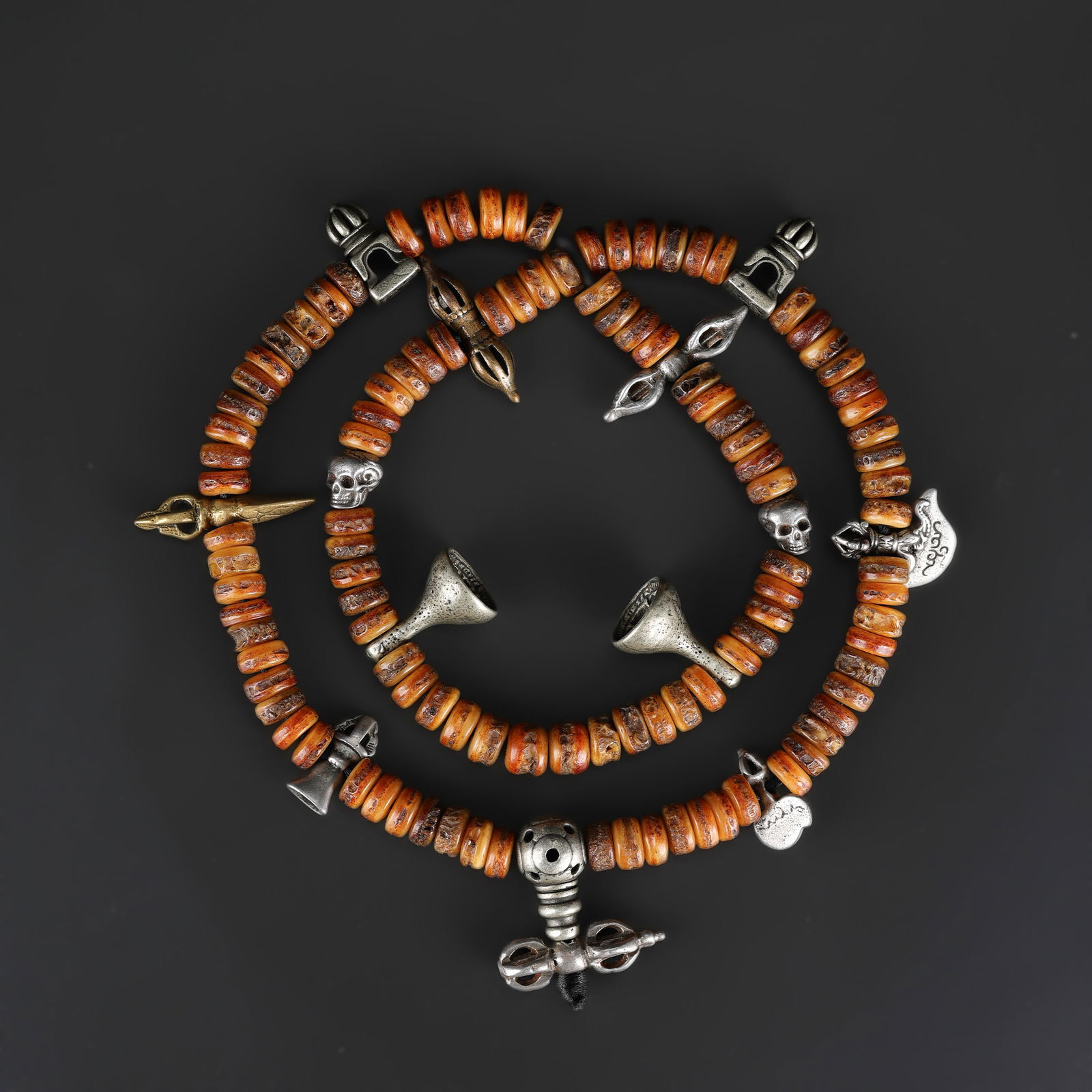 Tibetan Kapala 108-Bead Ritual Prayer Mala with Bronze Amulets: Tibetan Kapala ritual prayer mala composed of 108 beads, accented with bronze amulets. Weight: 149gram