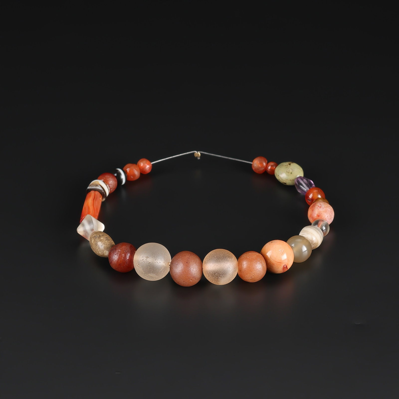 Collection of Ancient Himalayan, Nepalese, and Tibetan Mixed Old Beads: Rare collection of ancient beads from the Himalayan region, including Nepalese and Tibetan examples, composed of various materials and styles. Total Weight: 48gram