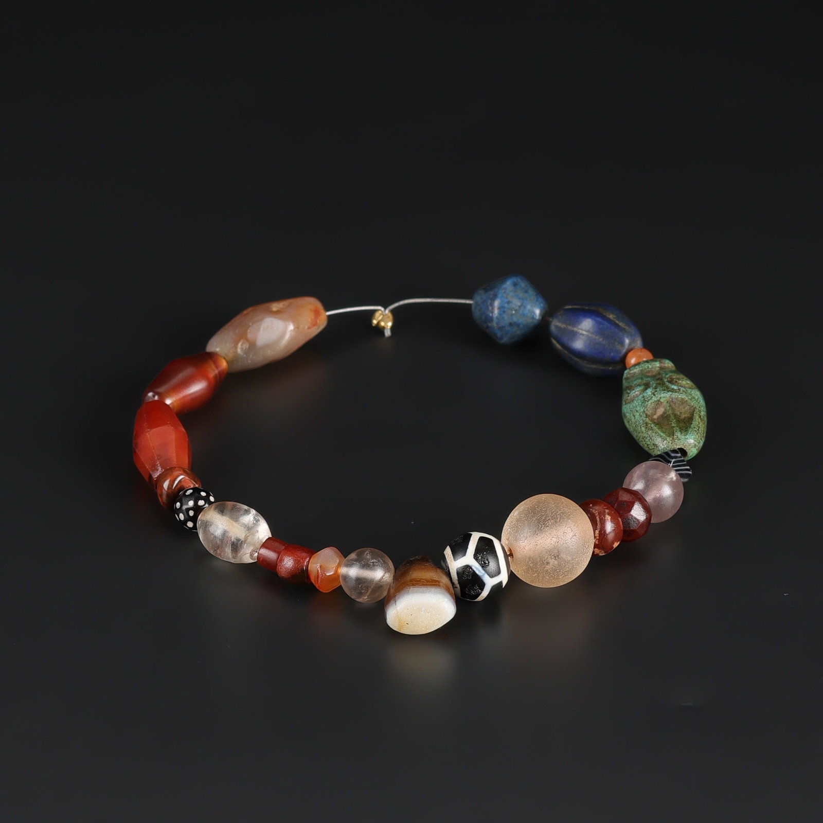 Collection of Ancient Himalayan, Nepalese, and Tibetan Mixed Old Beads: Rare collection of ancient beads from the Himalayan region, including Nepalese and Tibetan examples, composed of various materials and styles. Total Weight: 44gram