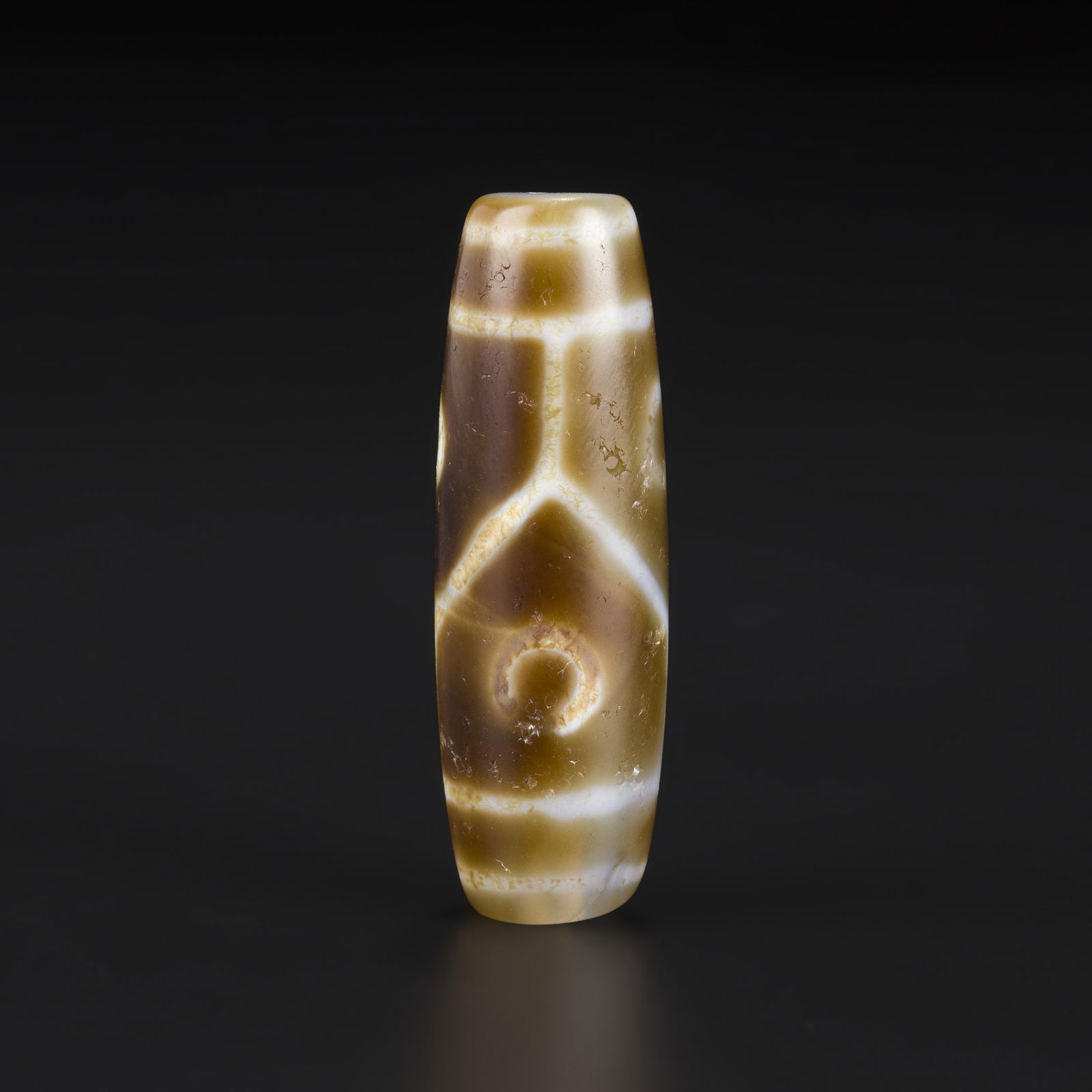 Tibetan 4-Eye Dzi Agate Bead: Tibetan 4-Eye Dzi Agate Bead Size Detail: 1.5 x 4.9cm Weight: 20gram