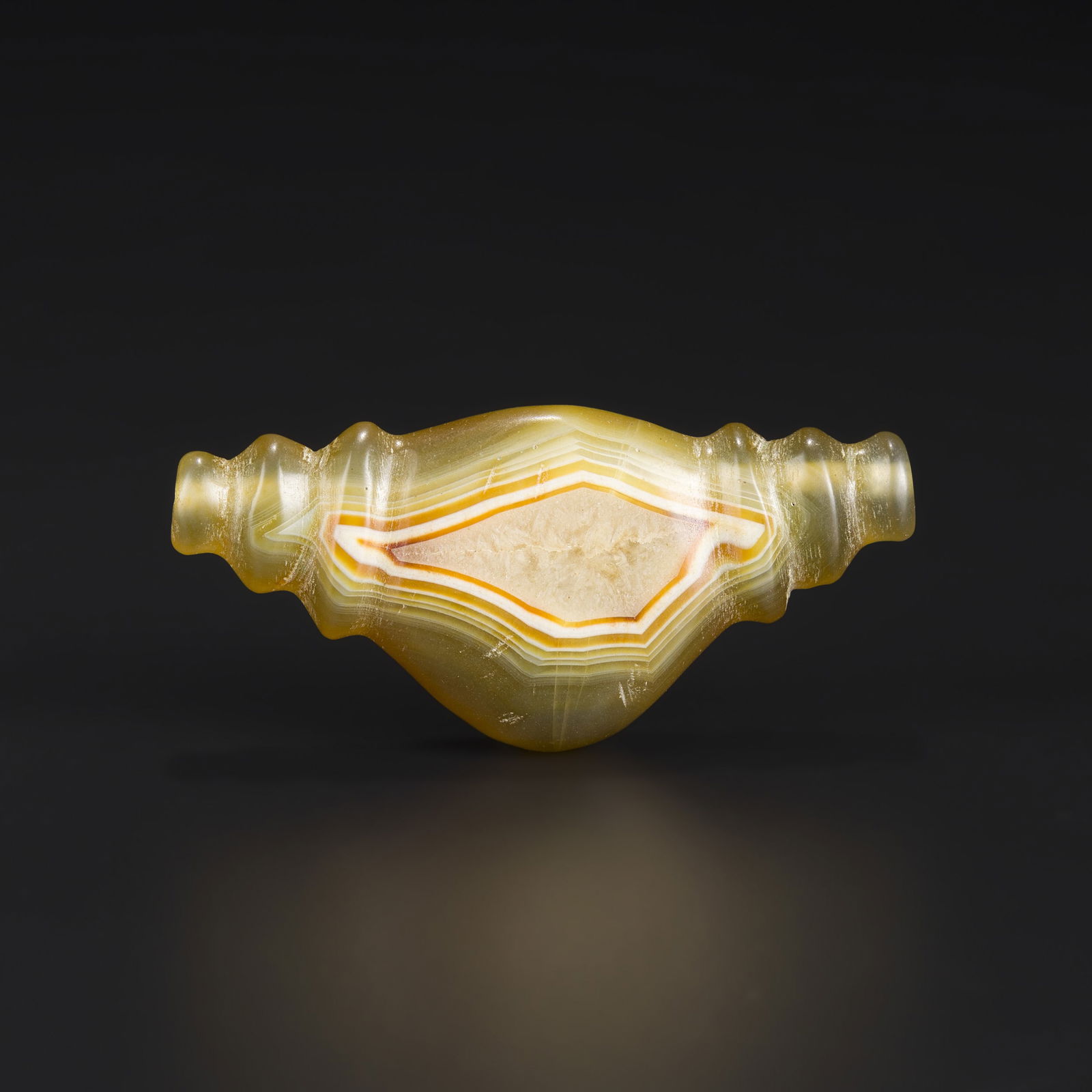 Bactrian Achaemenid Ancient Agate Bead Pendant, Horn-Shaped: Bactrian Achaemenid Ancient Agate Bead Pendant, Horn-Shaped. Size Detail: 7 x 3.2cm Weight: 31gram