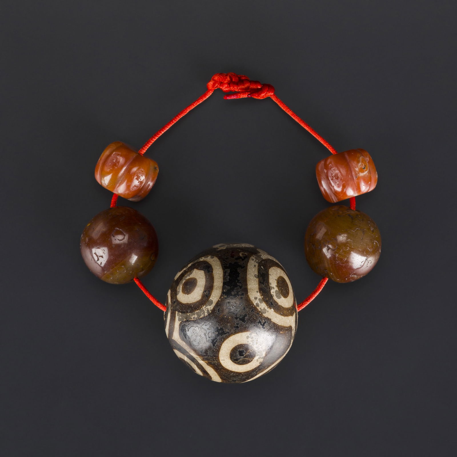 Collection of Tibetan Dzi Beads, Pema Raka, and Old Agate Beads: Collection of Tibetan Dzi Beads, Pema Raka, and Old Agate Beads. Total Weight: 340gram