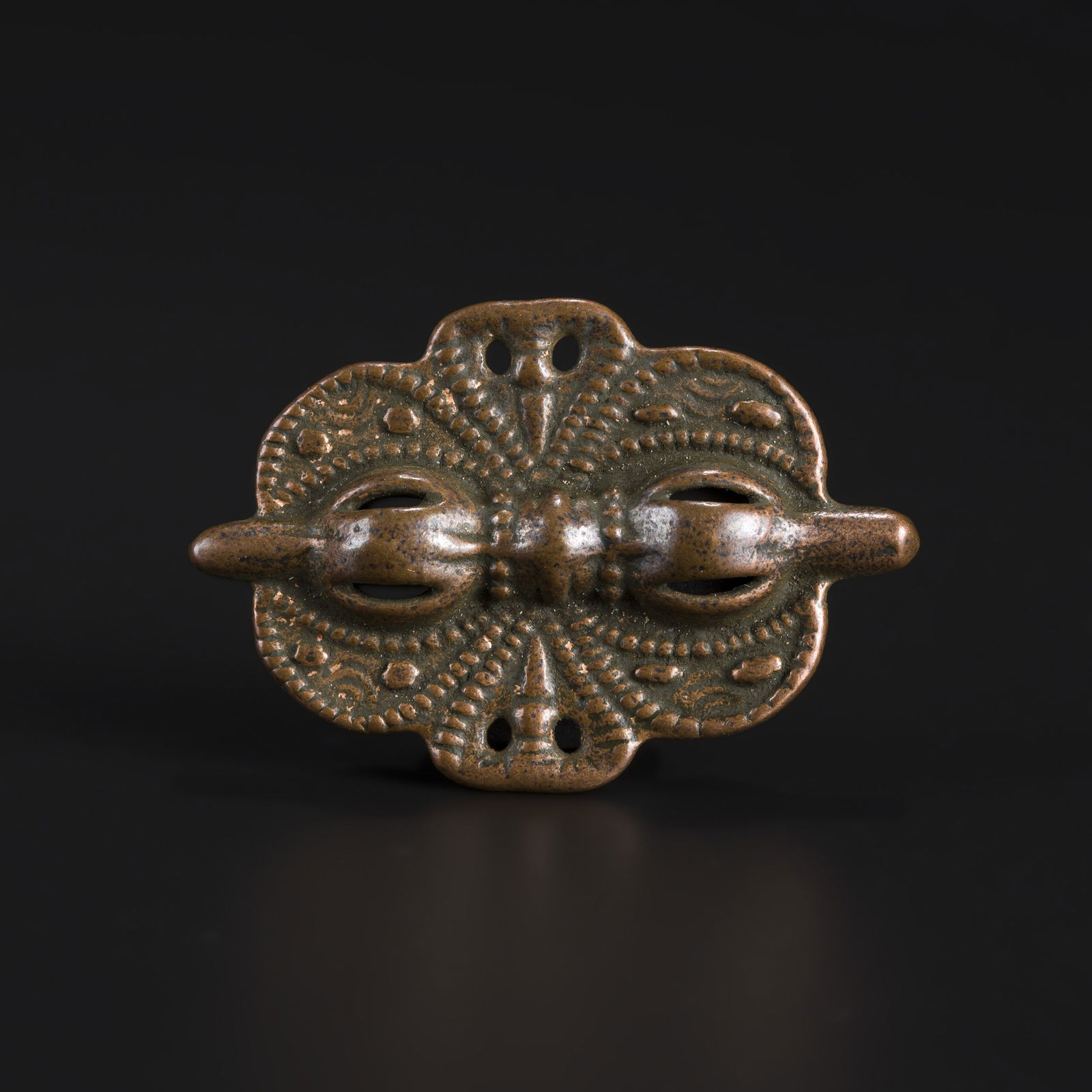 Qing Dynasty Tibetan Amulet with Double-Sided Openwork Butterfly-Shaped Vajra: Qing Dynasty Tibetan Amulet with Double-Sided Openwork Butterfly-Shaped Vajra Size Detail: 4.3 x 2.9cm Weight: 18gram