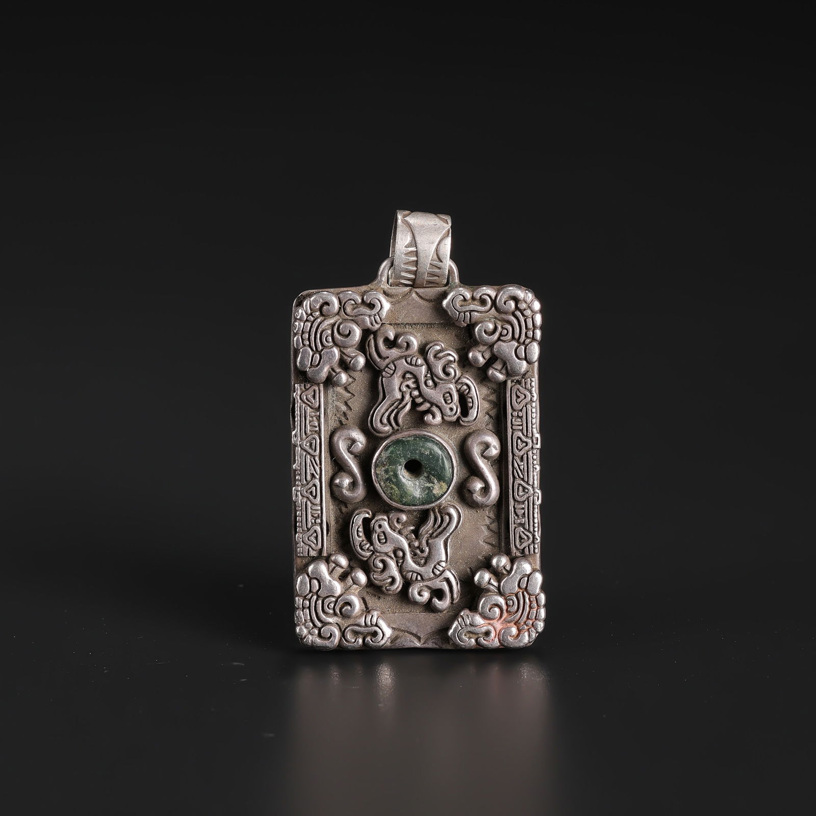 Qing Dynasty Chinese Silver Pendant Decorated with Dragon Motifs and Jade Stone: Qing Dynasty Chinese Silver Pendant Decorated with Dragon Motifs and Jade Stone. Size Detail: 3.1 x 5.6cm Weight: 29gram