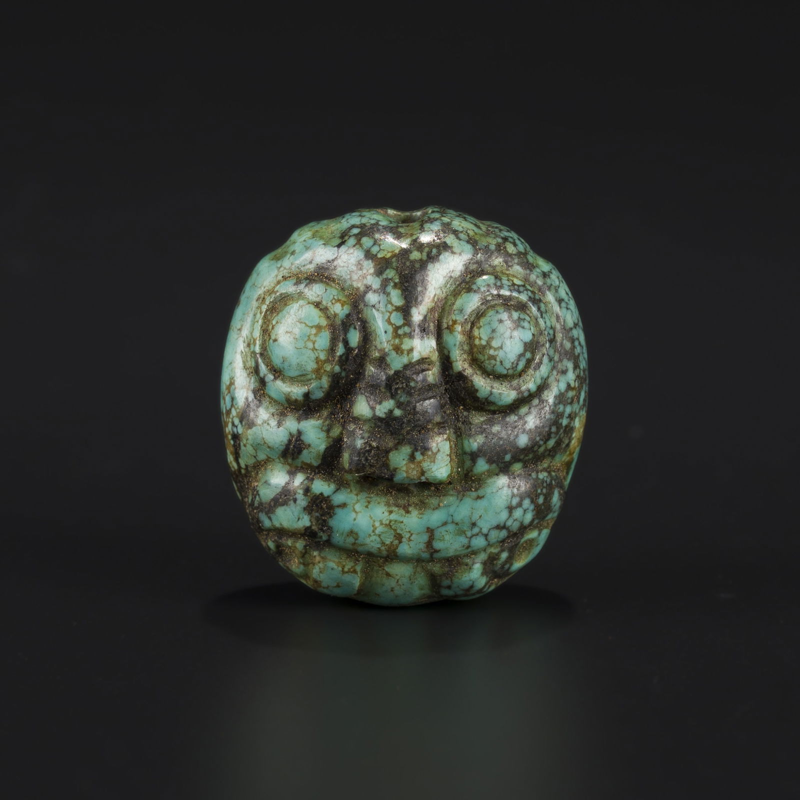 Neolithic Hongshan Turquoise Amulet Depicting Face: Neolithic Hongshan Turquoise Amulet Depicting Face. Size Detail: 2.5 x 2.7cm Weight: 16gram