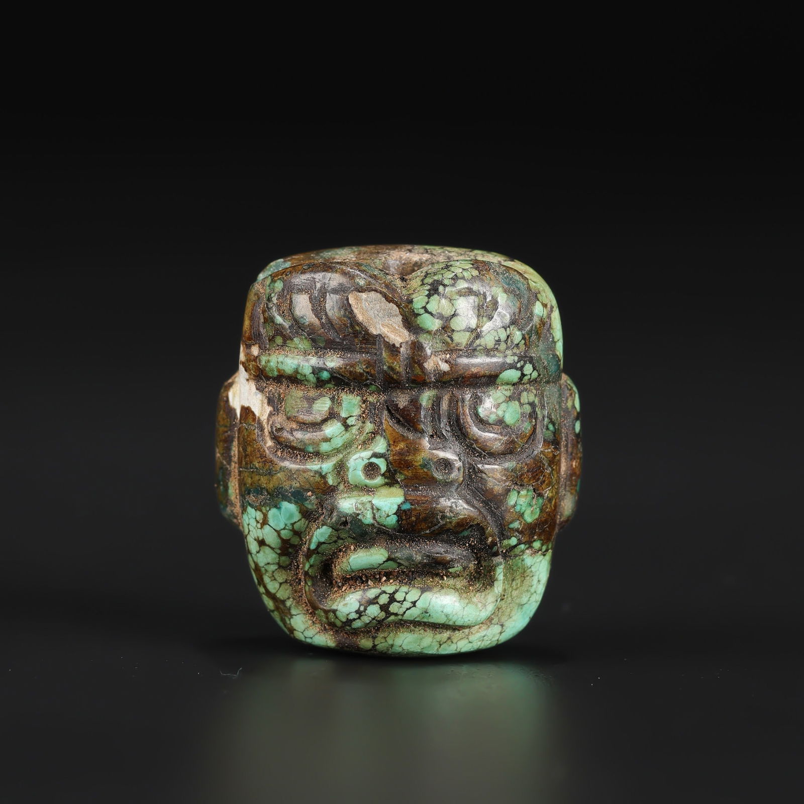 Neolithic Hongshan Turquoise Amulet Depicting Face Mask: Neolithic Hongshan Turquoise Amulet Depicting Face Mask Size Detail: 2.7 x 3cm Weight: 18gram