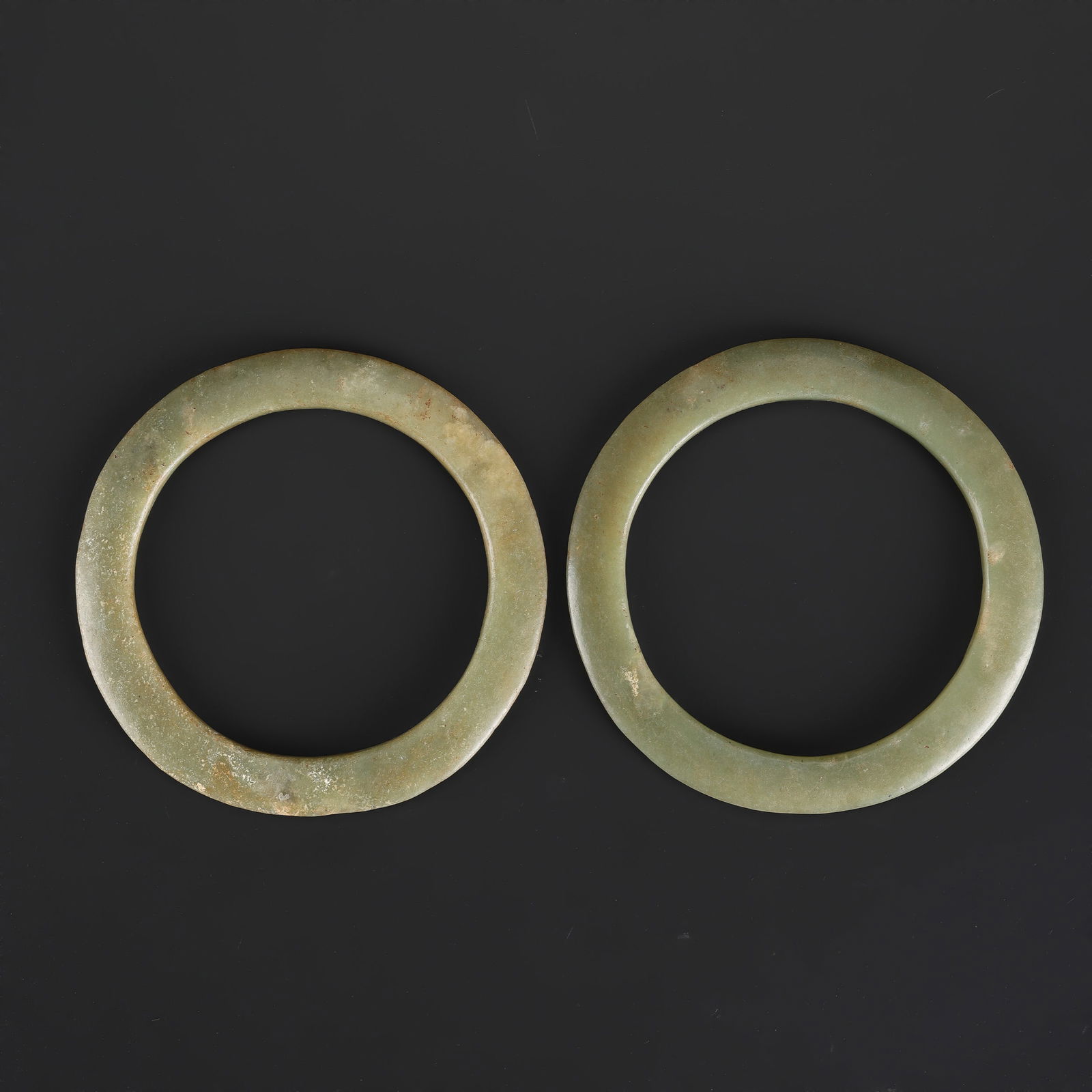 Pair of Ancient Chinese Neolithic Jade Bangle: Pair of Ancient Chinese Neolithic Jade Bangle. Total Weight: 77gram