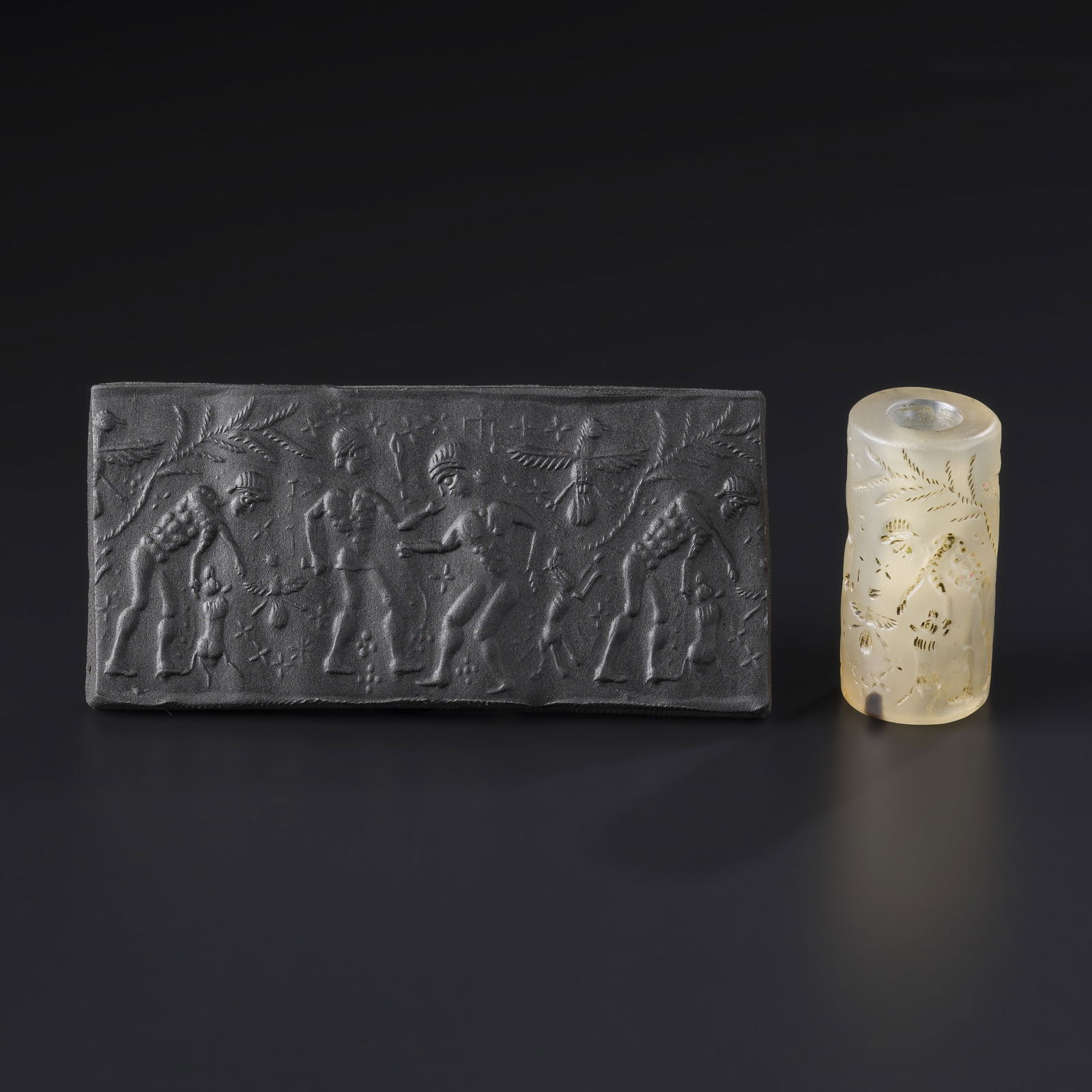 Near Eastern Sasanian Agate Cylinder Seal Pendant: Near Eastern Sasanian agate cylinder seal pendant featuring detailed engraved designs and figures, Photos include impressions made on wax clay to show the design clearly. Size Detail: 1.4 x 2.8 cm Wei