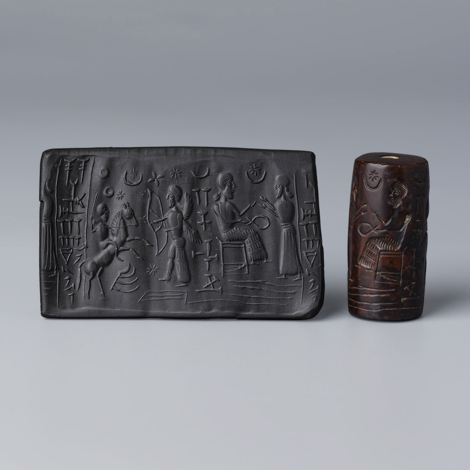 Near Eastern Bactrian Sasanian Stone Cylinder Seal Bead: Near Eastern Bactrian Sasanian Stone Cylinder Seal Bead.Photos include impressions made on wax clay to clearly display the carved imagery. Size Detail: 2.5 x 5.1 cm Weight: 60 grams