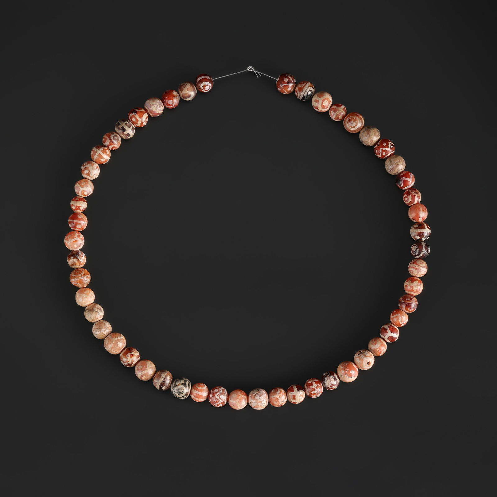 Collection of Etched Painted Carnelian Beads: Collection of Etched Painted Carnelian Beads Length: 21in Total Weight: 84gram