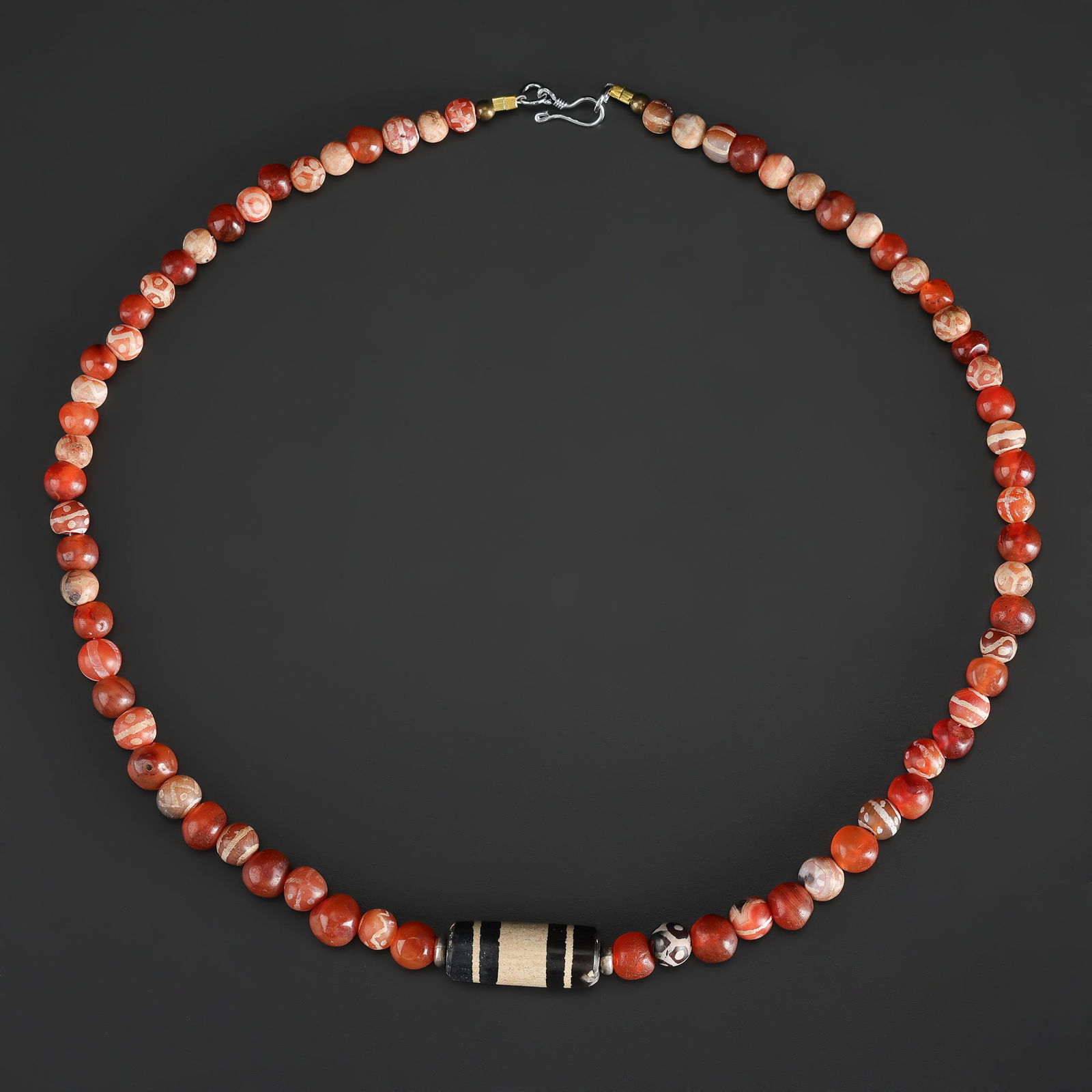 Collection of Etched Carnelian Agate Beads: Collection of Etched Carnelian Agate Beads Length: 19in Total Weight: 46gram