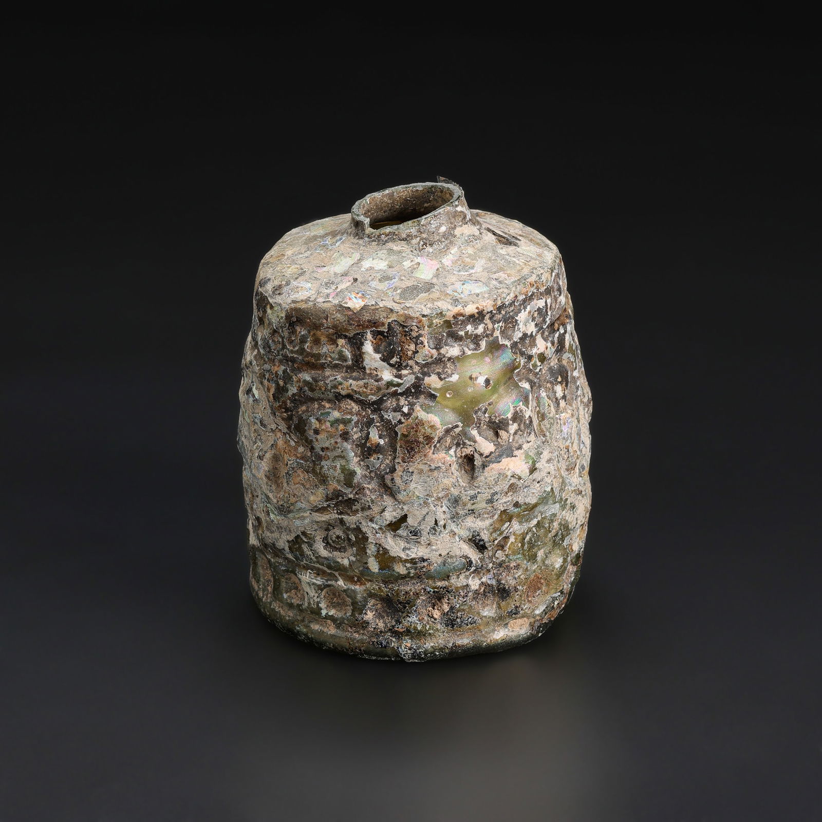 Large Ancient Roman Glass Bottle with Iridescent Patina: Large Ancient Roman Glass Bottle with Iridescent Patina Large Ancient Roman Glass Bottle with Iridescent Patina Size Details: 8 x 10cm Total Weight: 259gram