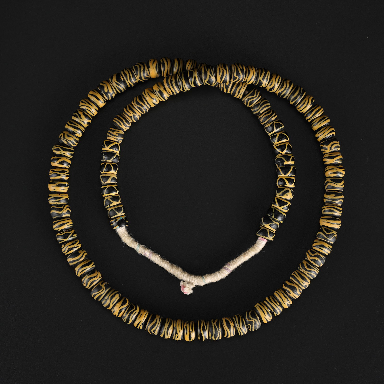 Antique Venetian Trade Black and Yellow Rattlesnake Beads: Antique Venetian Trade Black and Yellow Rattlesnake Beads Length: 37in Total Weight: 227gram