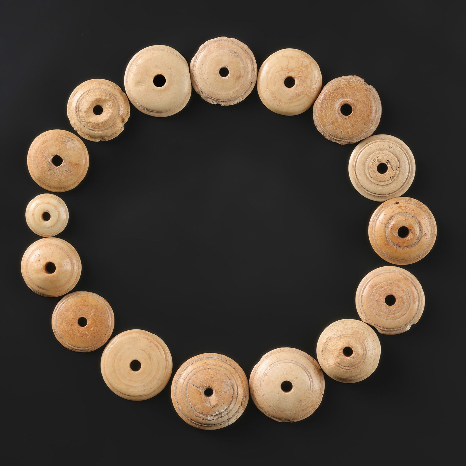 Collection of Sassanian Bone Spindle Whorls (1 of 4)