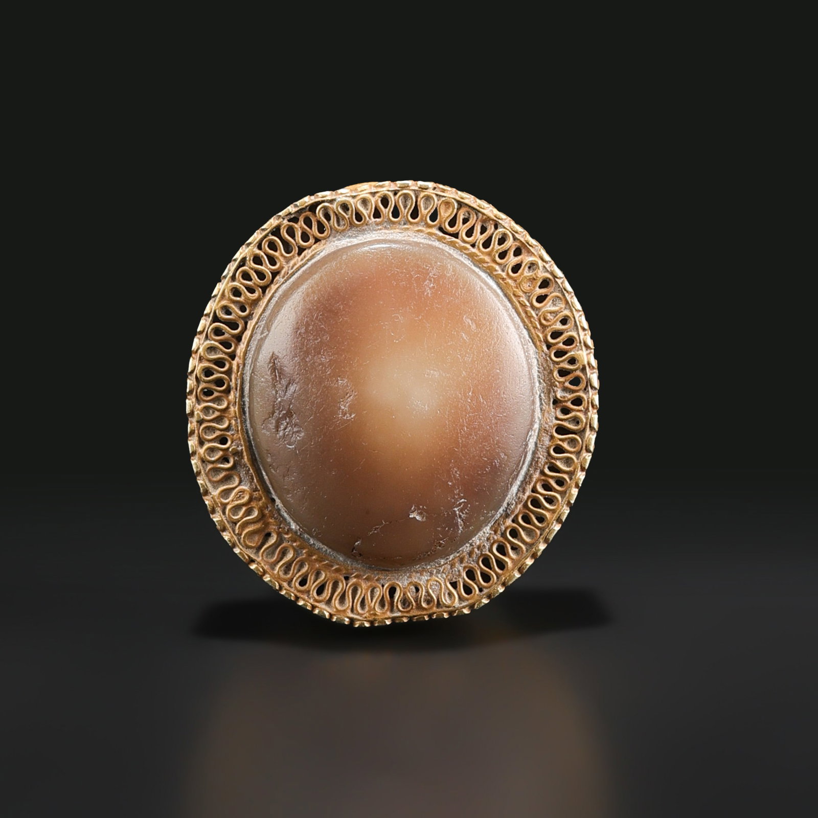 Old Agate Stone with 15K Gold Mounted Pendant: Old agate stone pendant mounted in 15K gold. The piece features a natural agate stone with visible color variation and a finely detailed gold setting. A collectible pendant with classic craftsmanship.